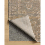 The Louisa Collection is a serene area rug based on beautiful, traditional Turkish designs updated in calm colorways by Chris Loves Julia in collaboration with Loloi. Pale blues, creams, and browns create a sense of softness, but so does the rugs pile, which is made of easy-to-clean, velvety polyester. Amethyst Home provides interior design, new home construction design consulting, vintage area rugs, and lighting in the Alpharetta metro area.