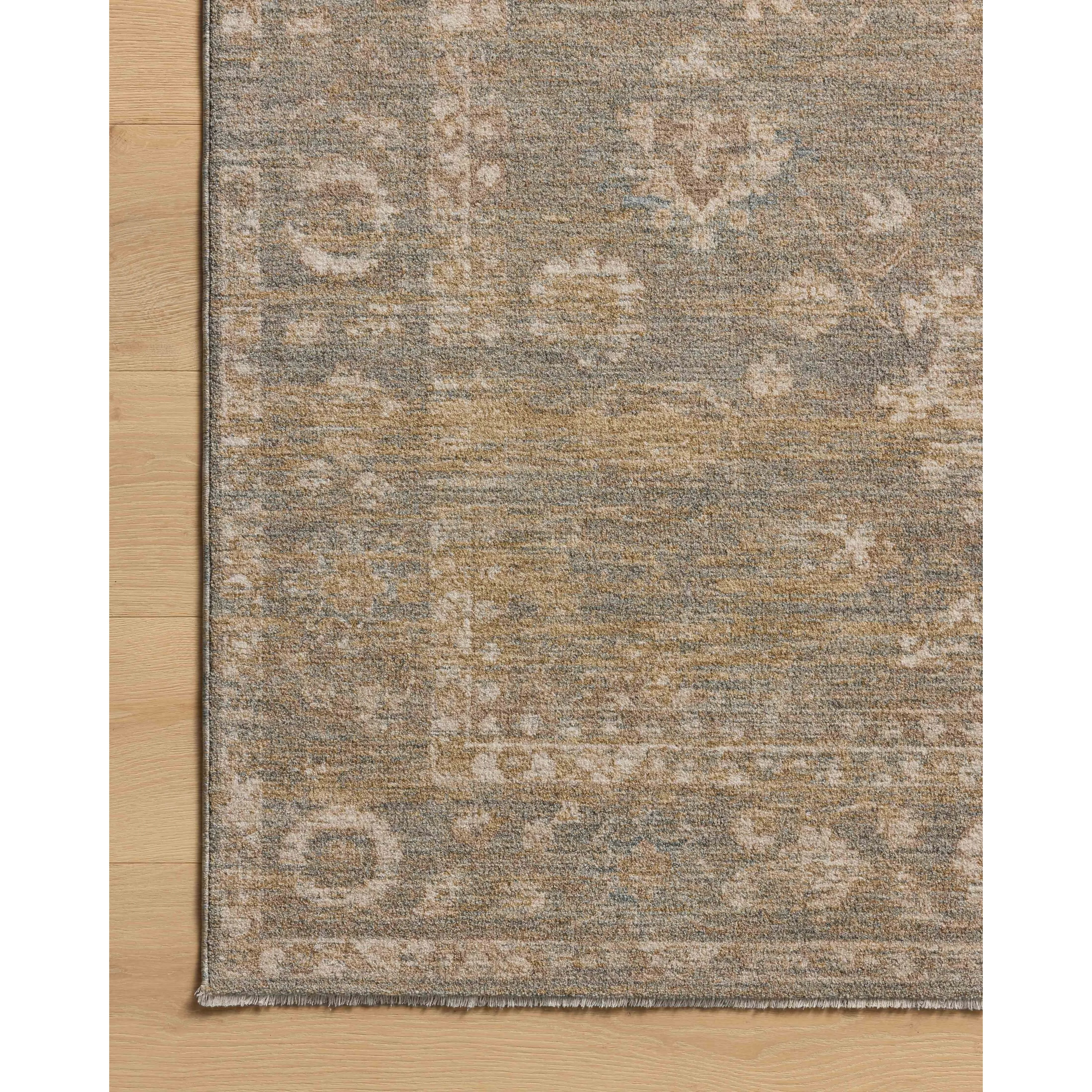 The Louisa Collection is a serene area rug based on beautiful, traditional Turkish designs updated in calm colorways by Chris Loves Julia in collaboration with Loloi. Pale blues, creams, and browns create a sense of softness, but so does the rugs pile, which is made of easy-to-clean, velvety polyester. Amethyst Home provides interior design, new home construction design consulting, vintage area rugs, and lighting in the Winter Garden metro area.