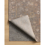 The Louisa Collection is a serene area rug based on beautiful, traditional Turkish designs updated in calm colorways by Chris Loves Julia in collaboration with Loloi. Pale blues, creams, and browns create a sense of softness, but so does the rugs pile, which is made of easy-to-clean, velvety polyester. Amethyst Home provides interior design, new home construction design consulting, vintage area rugs, and lighting in the Dallas metro area.