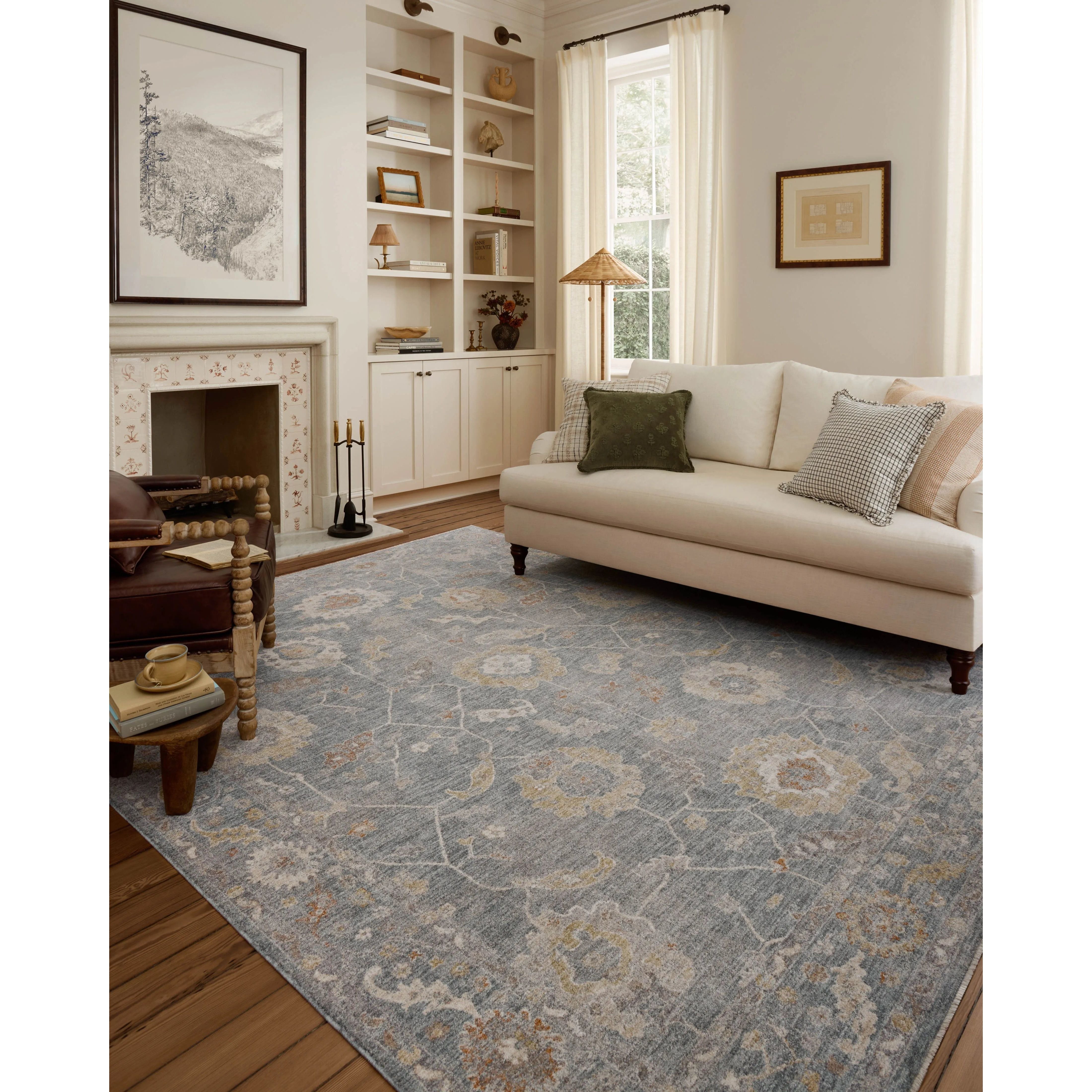 The Louisa Collection is a serene area rug based on beautiful, traditional Turkish designs updated in calm colorways by Chris Loves Julia in collaboration with Loloi. Pale blues, creams, and browns create a sense of softness, but so does the rugs pile, which is made of easy-to-clean, velvety polyester. Amethyst Home provides interior design, new home construction design consulting, vintage area rugs, and lighting in the Des Moines metro area.
