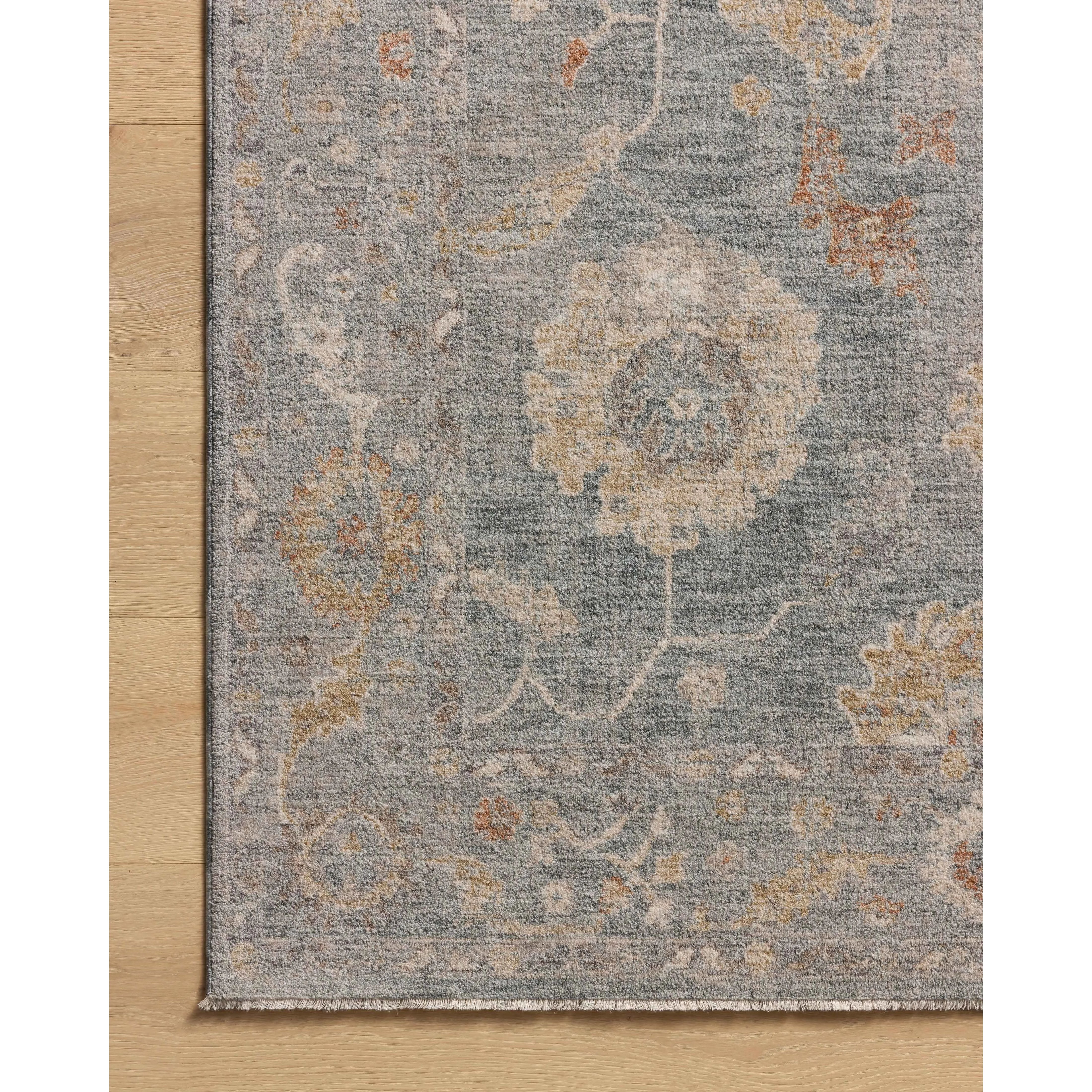 The Louisa Collection is a serene area rug based on beautiful, traditional Turkish designs updated in calm colorways by Chris Loves Julia in collaboration with Loloi. Pale blues, creams, and browns create a sense of softness, but so does the rugs pile, which is made of easy-to-clean, velvety polyester. Amethyst Home provides interior design, new home construction design consulting, vintage area rugs, and lighting in the Kansas City metro area.