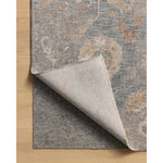 The Louisa Collection is a serene area rug based on beautiful, traditional Turkish designs updated in calm colorways by Chris Loves Julia in collaboration with Loloi. Pale blues, creams, and browns create a sense of softness, but so does the rugs pile, which is made of easy-to-clean, velvety polyester. Amethyst Home provides interior design, new home construction design consulting, vintage area rugs, and lighting in the Laguna Beach metro area.