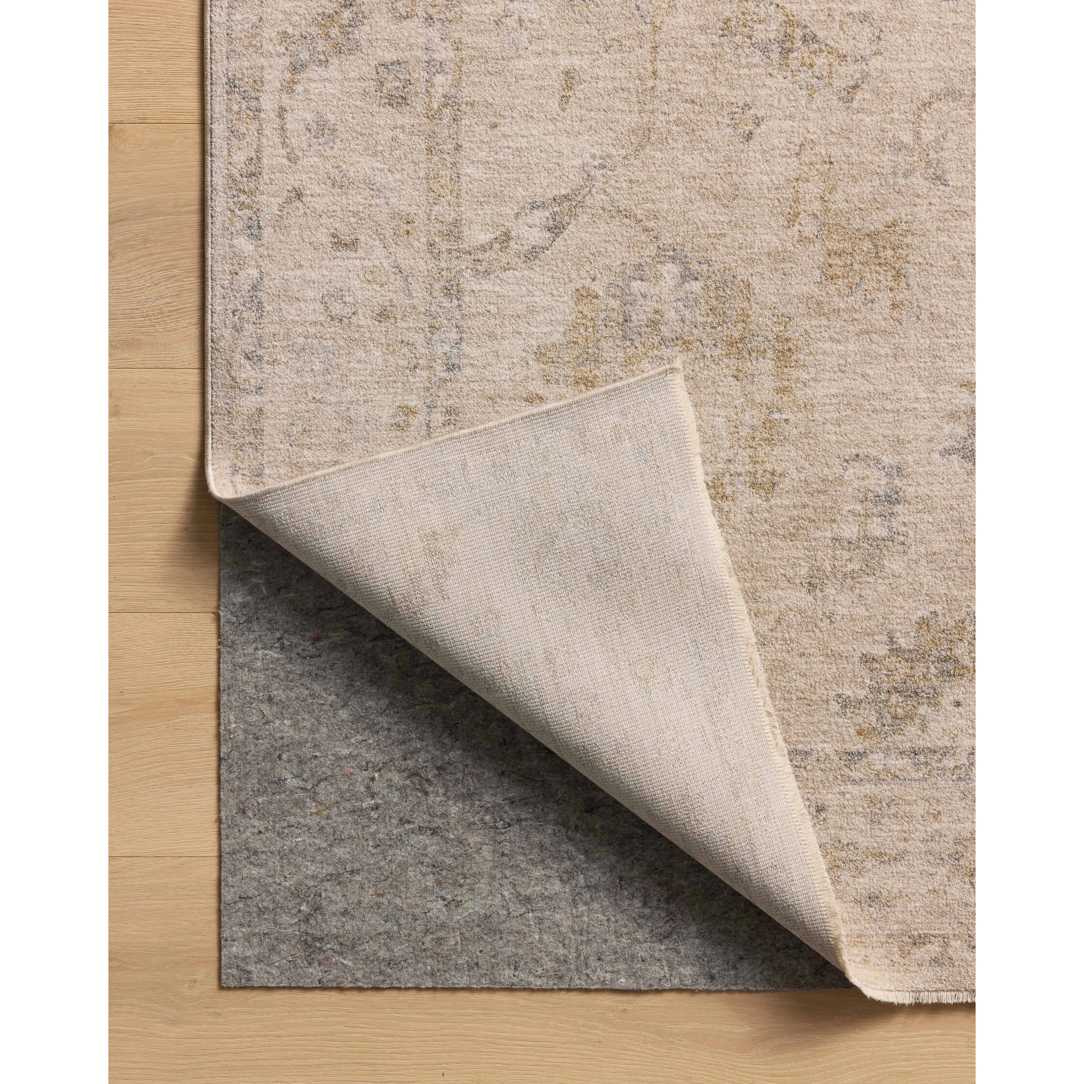 The Louisa Collection is a serene area rug based on beautiful, traditional Turkish designs updated in calm colorways by Chris Loves Julia in collaboration with Loloi. Pale blues, creams, and browns create a sense of softness, but so does the rugs pile, which is made of easy-to-clean, velvety polyester. Amethyst Home provides interior design, new home construction design consulting, vintage area rugs, and lighting in the Winter Garden metro area.