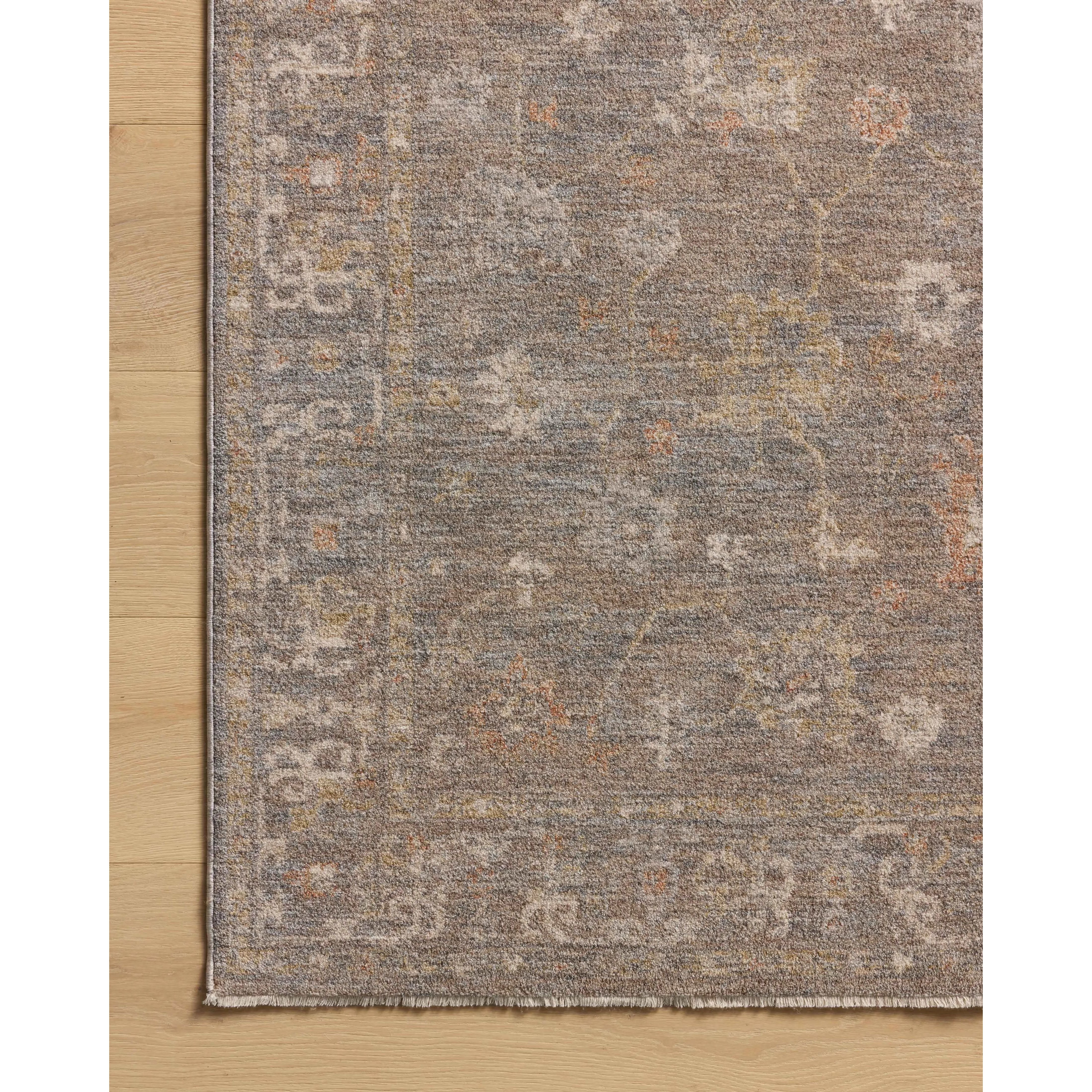 The Louisa Collection is a serene area rug based on beautiful, traditional Turkish designs updated in calm colorways by Chris Loves Julia in collaboration with Loloi. Pale blues, creams, and browns create a sense of softness, but so does the rugs pile, which is made of easy-to-clean, velvety polyester. Amethyst Home provides interior design, new home construction design consulting, vintage area rugs, and lighting in the Nashville metro area.
