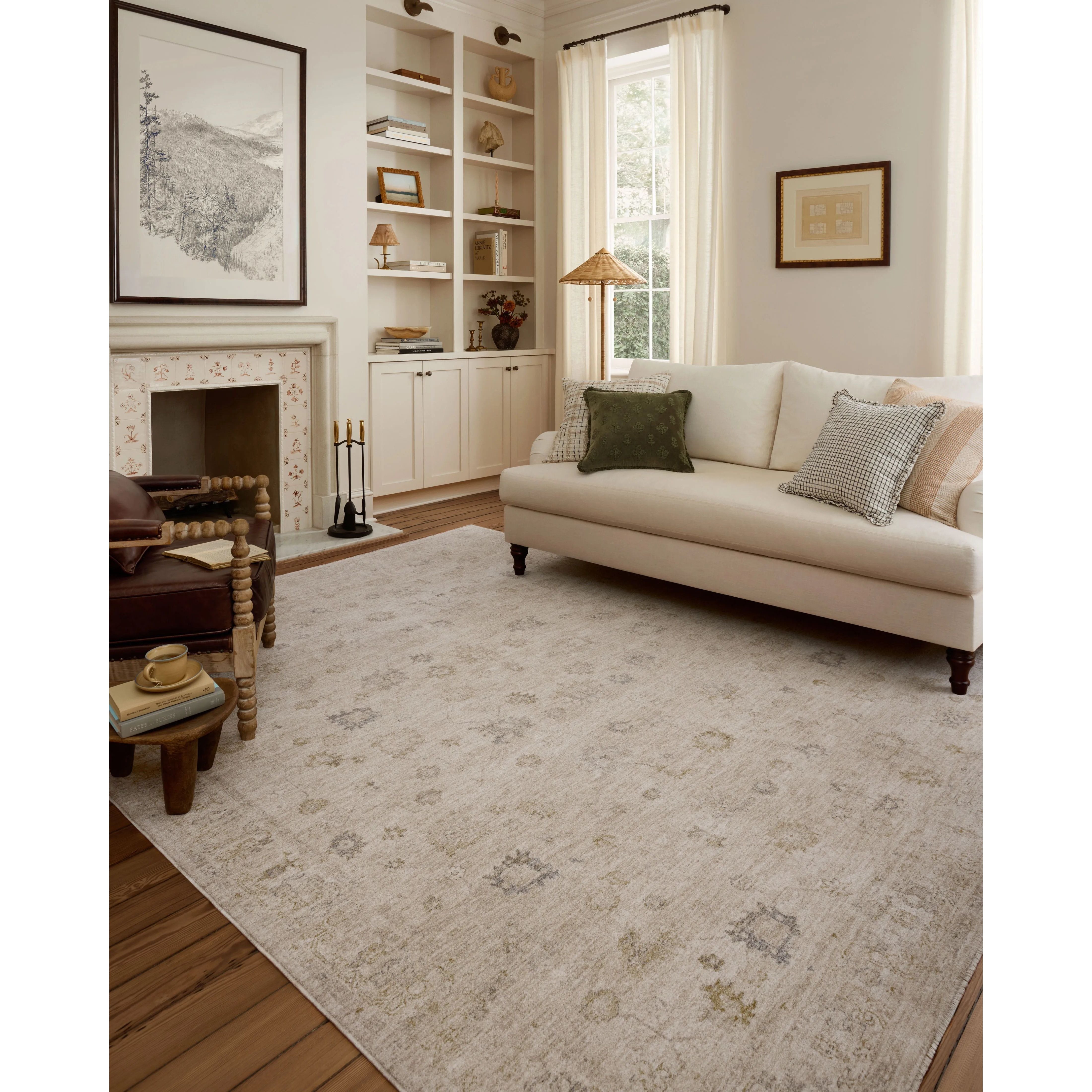 The Louisa Collection is a serene area rug based on beautiful, traditional Turkish designs updated in calm colorways by Chris Loves Julia in collaboration with Loloi. Pale blues, creams, and browns create a sense of softness, but so does the rugs pile, which is made of easy-to-clean, velvety polyester. Amethyst Home provides interior design, new home construction design consulting, vintage area rugs, and lighting in the Washington metro area.