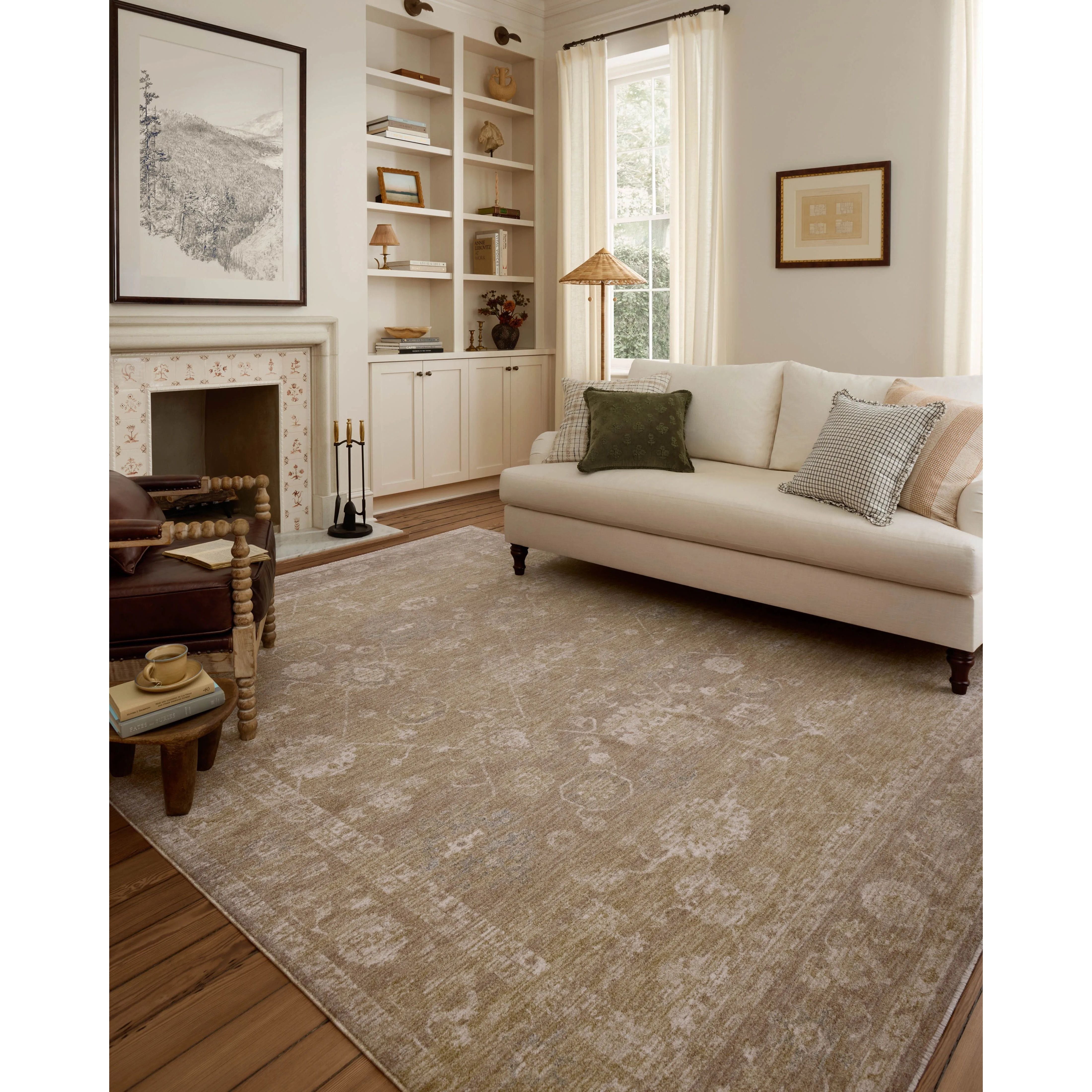 The Louisa Collection is a serene area rug based on beautiful, traditional Turkish designs updated in calm colorways by Chris Loves Julia in collaboration with Loloi. Pale blues, creams, and browns create a sense of softness, but so does the rugs pile, which is made of easy-to-clean, velvety polyester. Amethyst Home provides interior design, new home construction design consulting, vintage area rugs, and lighting in the Dallas metro area.