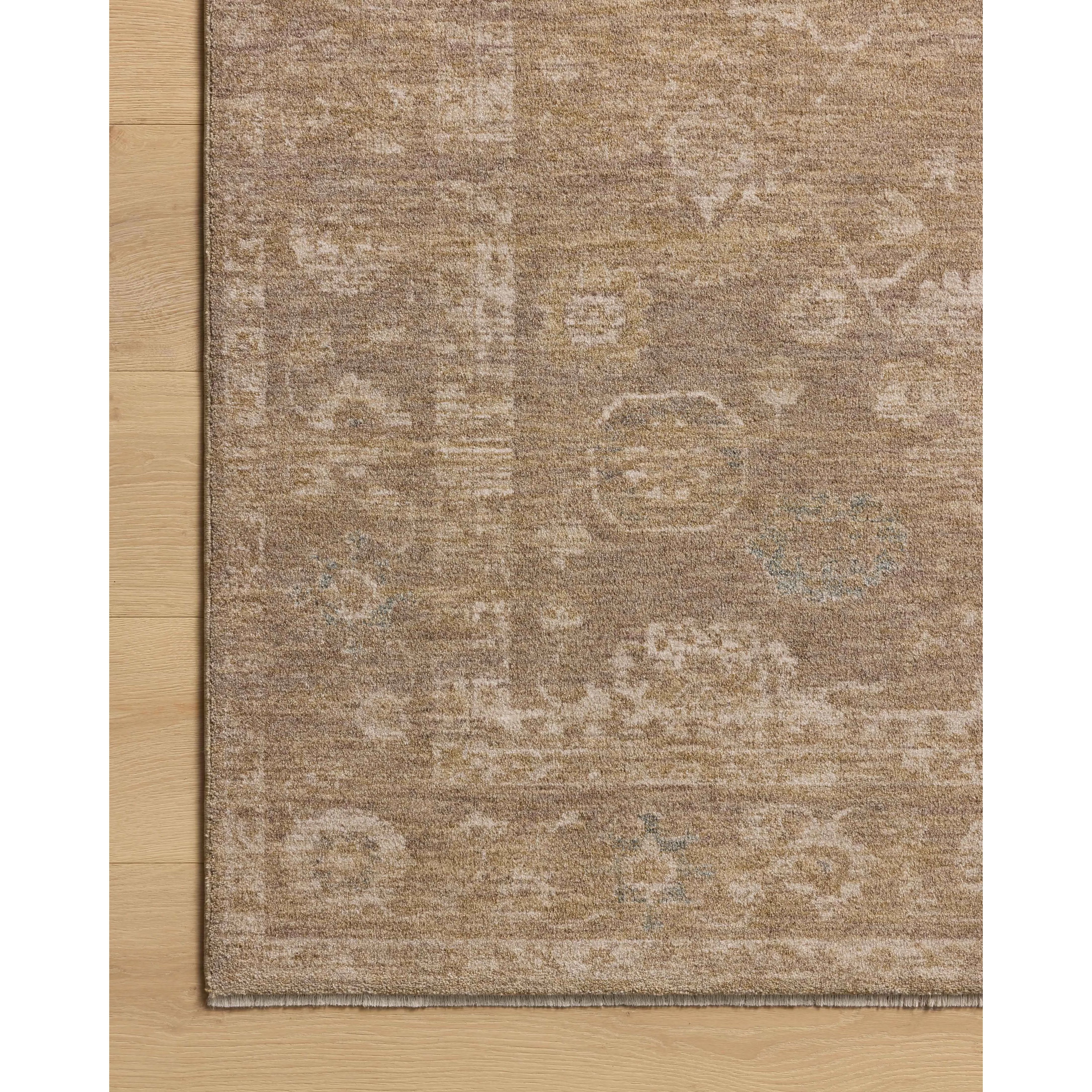 The Louisa Collection is a serene area rug based on beautiful, traditional Turkish designs updated in calm colorways by Chris Loves Julia in collaboration with Loloi. Pale blues, creams, and browns create a sense of softness, but so does the rugs pile, which is made of easy-to-clean, velvety polyester. Amethyst Home provides interior design, new home construction design consulting, vintage area rugs, and lighting in the Scottsdale metro area.