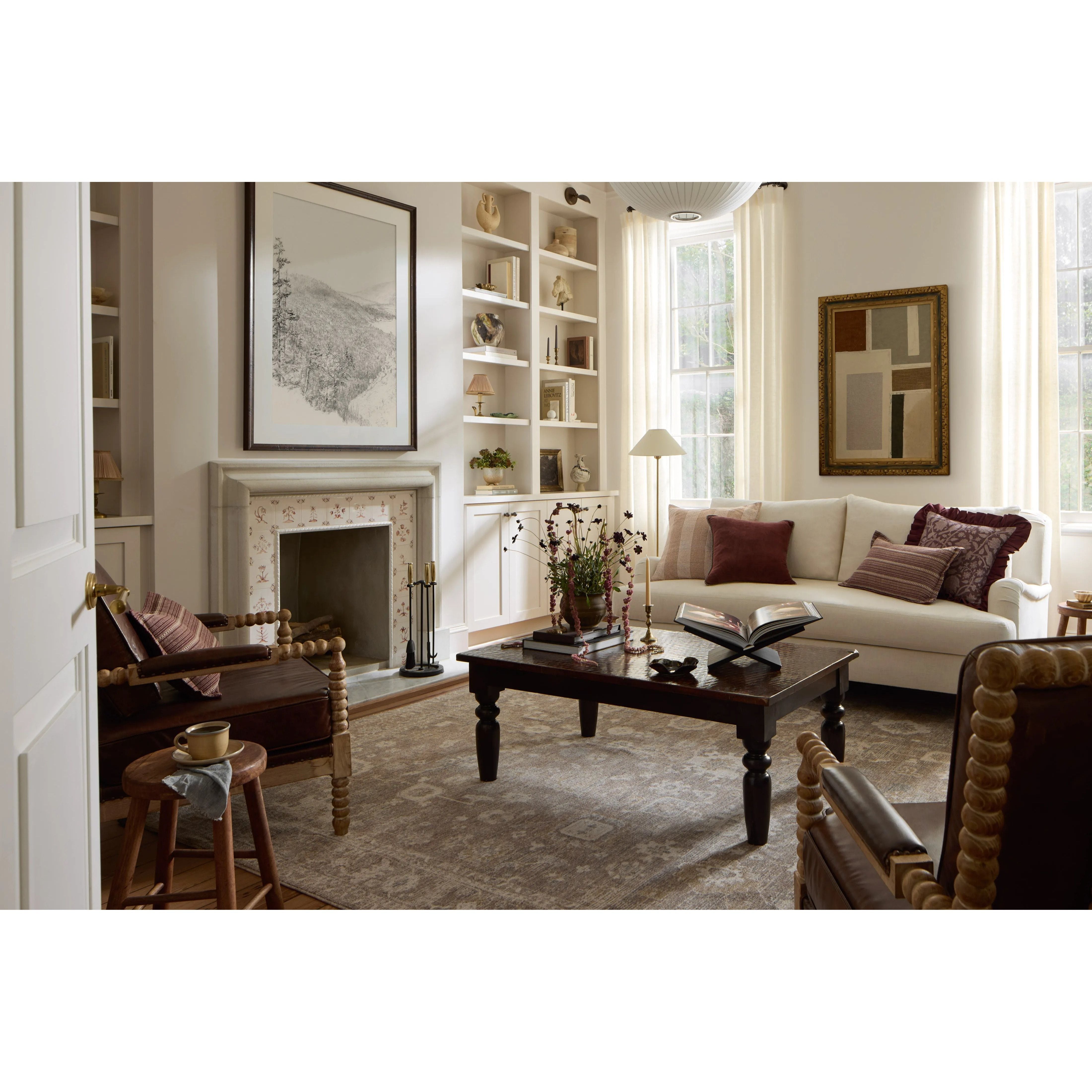 The Louisa Collection is a serene area rug based on beautiful, traditional Turkish designs updated in calm colorways by Chris Loves Julia in collaboration with Loloi. Pale blues, creams, and browns create a sense of softness, but so does the rugs pile, which is made of easy-to-clean, velvety polyester. Amethyst Home provides interior design, new home construction design consulting, vintage area rugs, and lighting in the Newport Beach metro area.