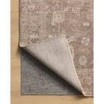 The Louisa Collection is a serene area rug based on beautiful, traditional Turkish designs updated in calm colorways by Chris Loves Julia in collaboration with Loloi. Pale blues, creams, and browns create a sense of softness, but so does the rugs pile, which is made of easy-to-clean, velvety polyester. Amethyst Home provides interior design, new home construction design consulting, vintage area rugs, and lighting in the Tampa metro area.