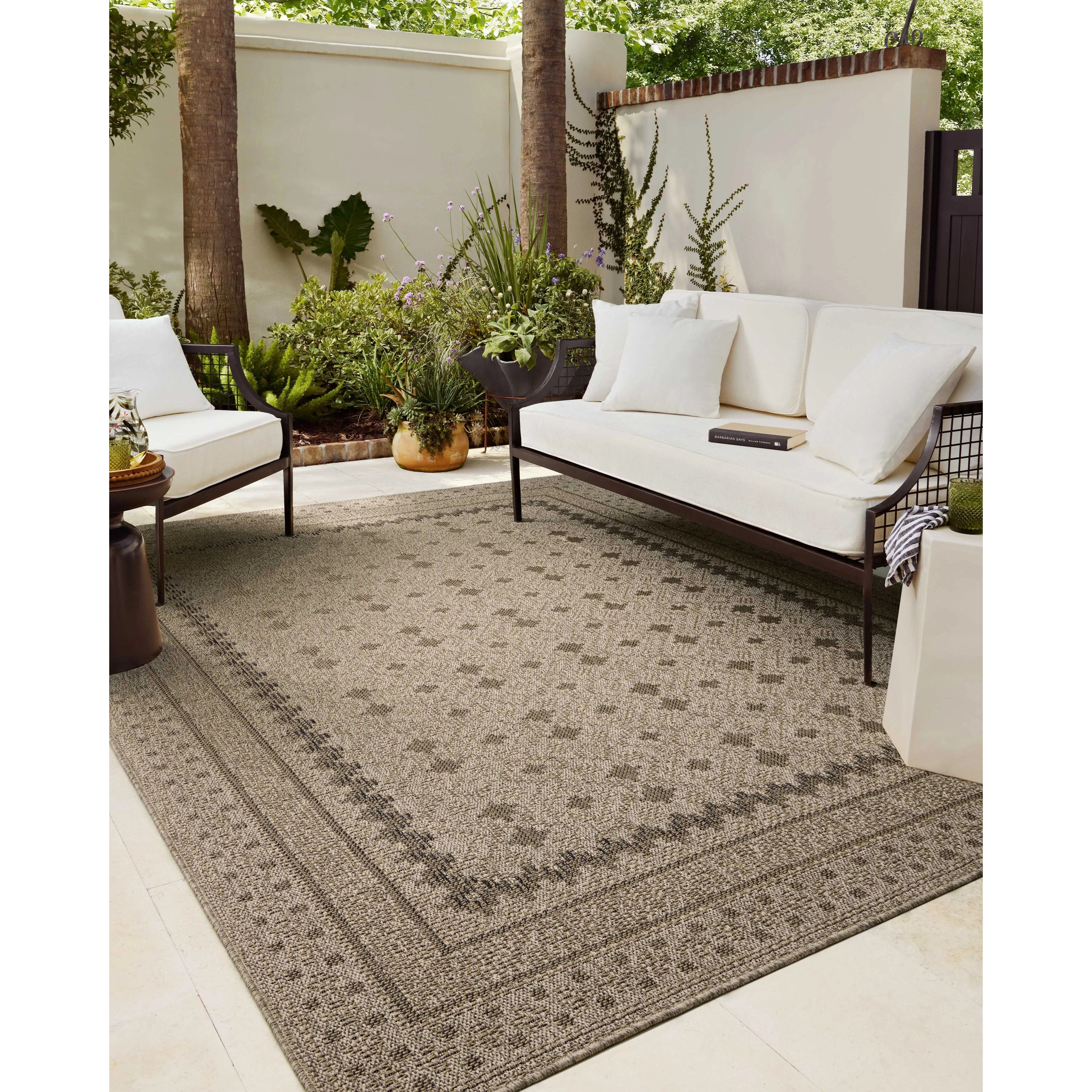 The Providence Collection is an indoor/outdoor rug with a woven-style design by Chris Loves Julia x Loloi. Providence is made of extra durable power-loomed polyester for versatile styling in patios, mudrooms, dining rooms, hallways, or more. Amethyst Home provides interior design, new home construction design consulting, vintage area rugs, and lighting in the Alpharetta metro area.