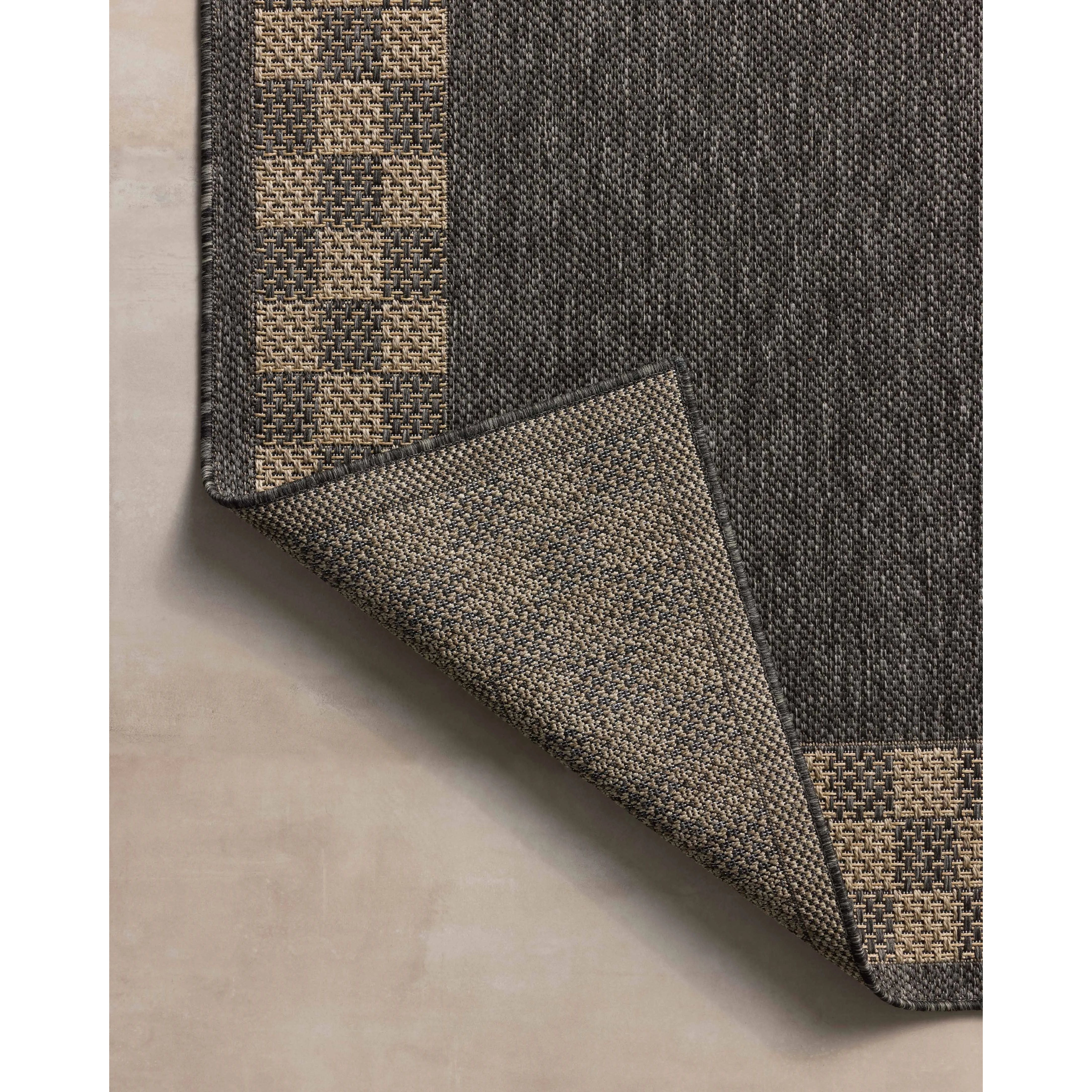 The Providence Collection is an indoor/outdoor rug with a woven-style design by Chris Loves Julia x Loloi. Providence is made of extra durable power-loomed polyester for versatile styling in patios, mudrooms, dining rooms, hallways, or more. Amethyst Home provides interior design, new home construction design consulting, vintage area rugs, and lighting in the Kansas City metro area.