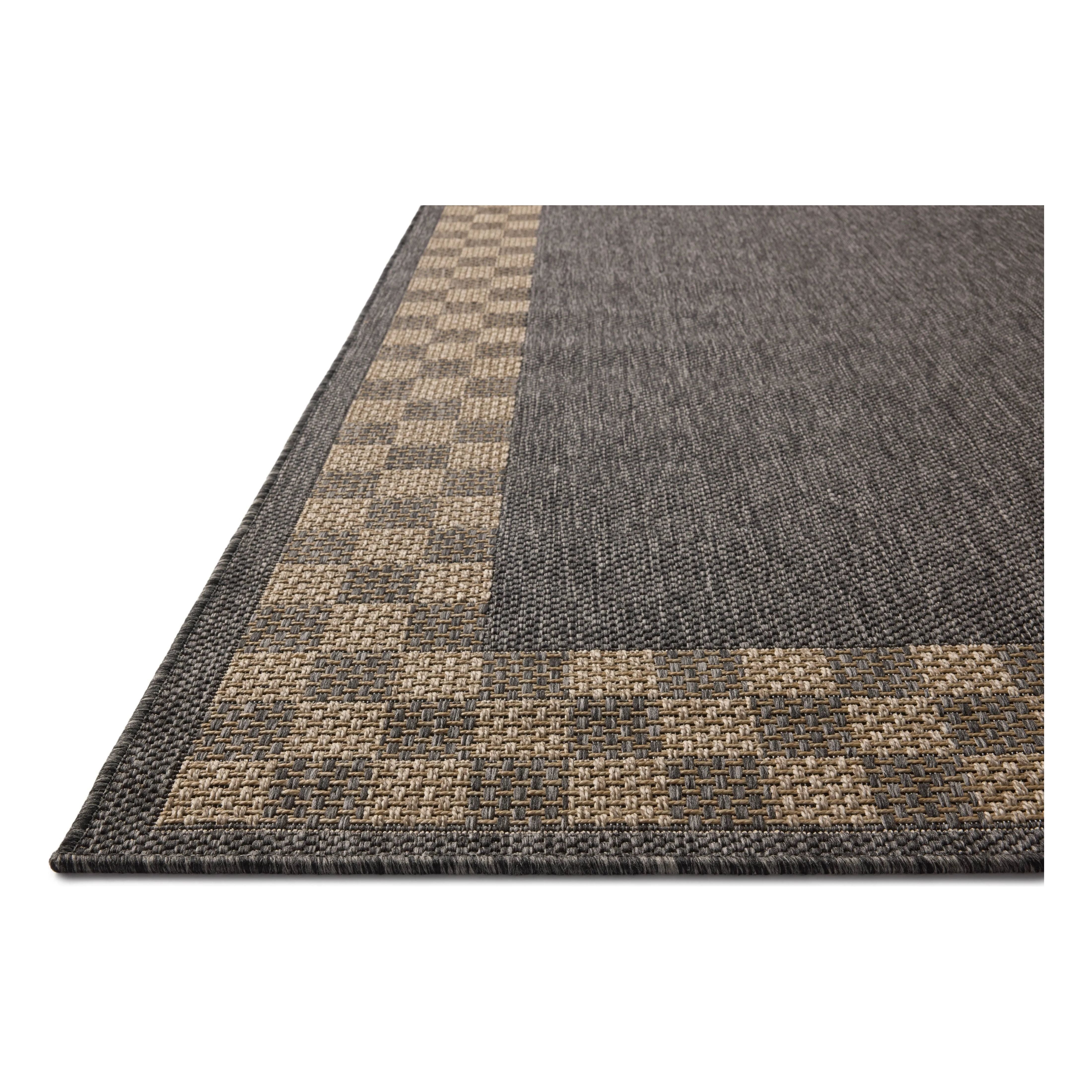 The Providence Collection is an indoor/outdoor rug with a woven-style design by Chris Loves Julia x Loloi. Providence is made of extra durable power-loomed polyester for versatile styling in patios, mudrooms, dining rooms, hallways, or more. Amethyst Home provides interior design, new home construction design consulting, vintage area rugs, and lighting in the Nashville metro area.
