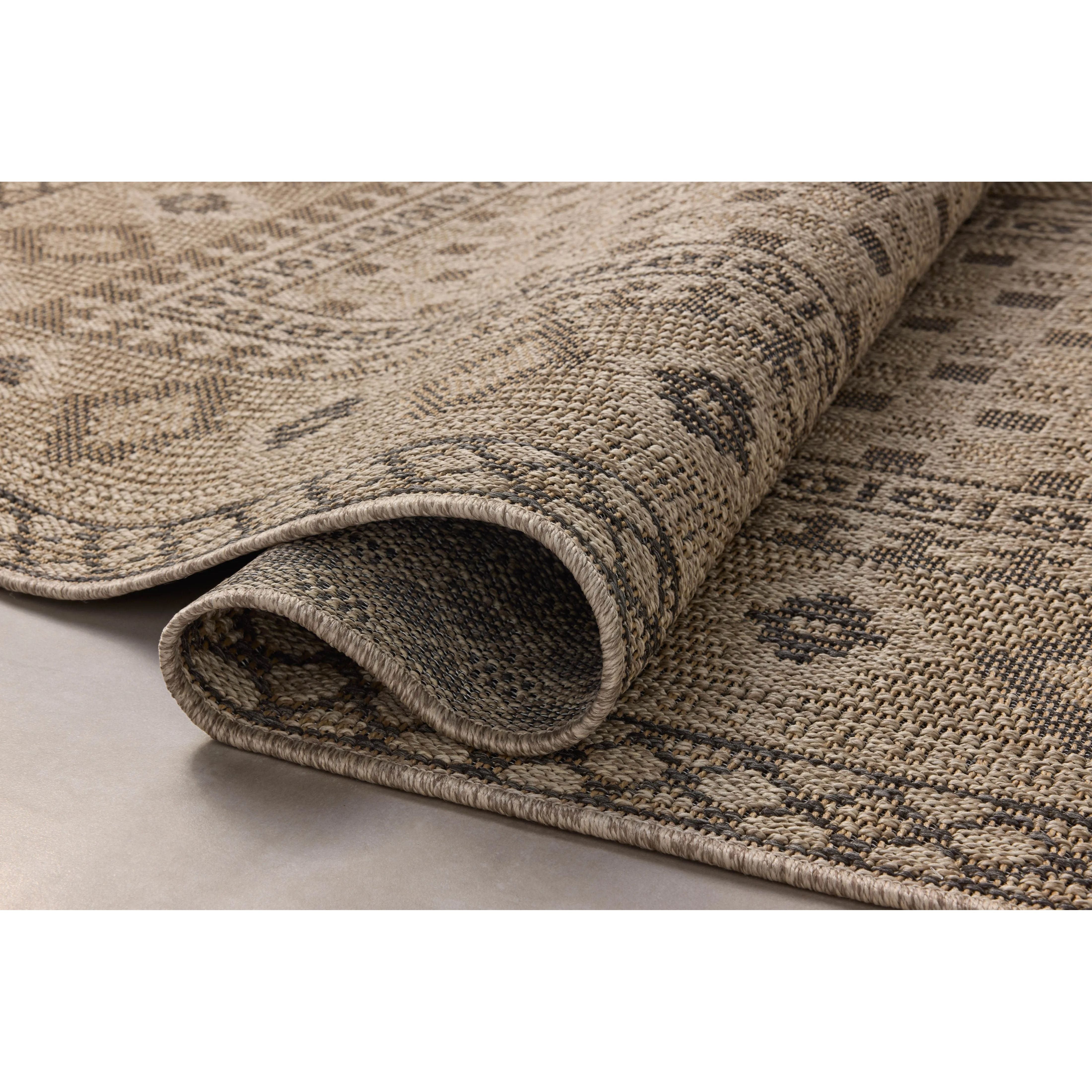 The Providence Collection is an indoor/outdoor rug with a woven-style design by Chris Loves Julia x Loloi. Providence is made of extra durable power-loomed polyester for versatile styling in patios, mudrooms, dining rooms, hallways, or more. Amethyst Home provides interior design, new home construction design consulting, vintage area rugs, and lighting in the Austin metro area.