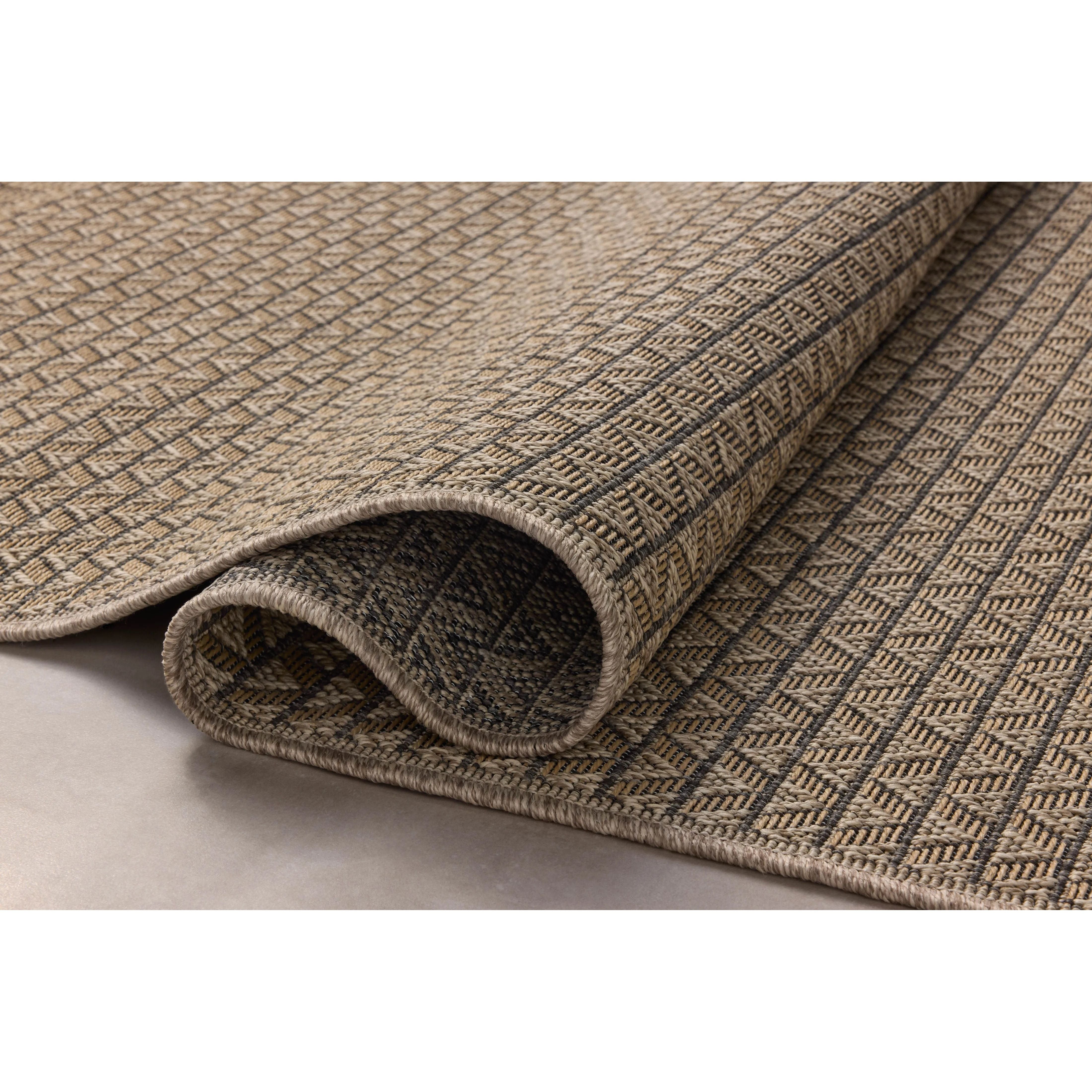 The Providence Collection is an indoor/outdoor rug with a woven-style design by Chris Loves Julia x Loloi. Providence is made of extra durable power-loomed polyester for versatile styling in patios, mudrooms, dining rooms, hallways, or more. Amethyst Home provides interior design, new home construction design consulting, vintage area rugs, and lighting in the Kansas City metro area.