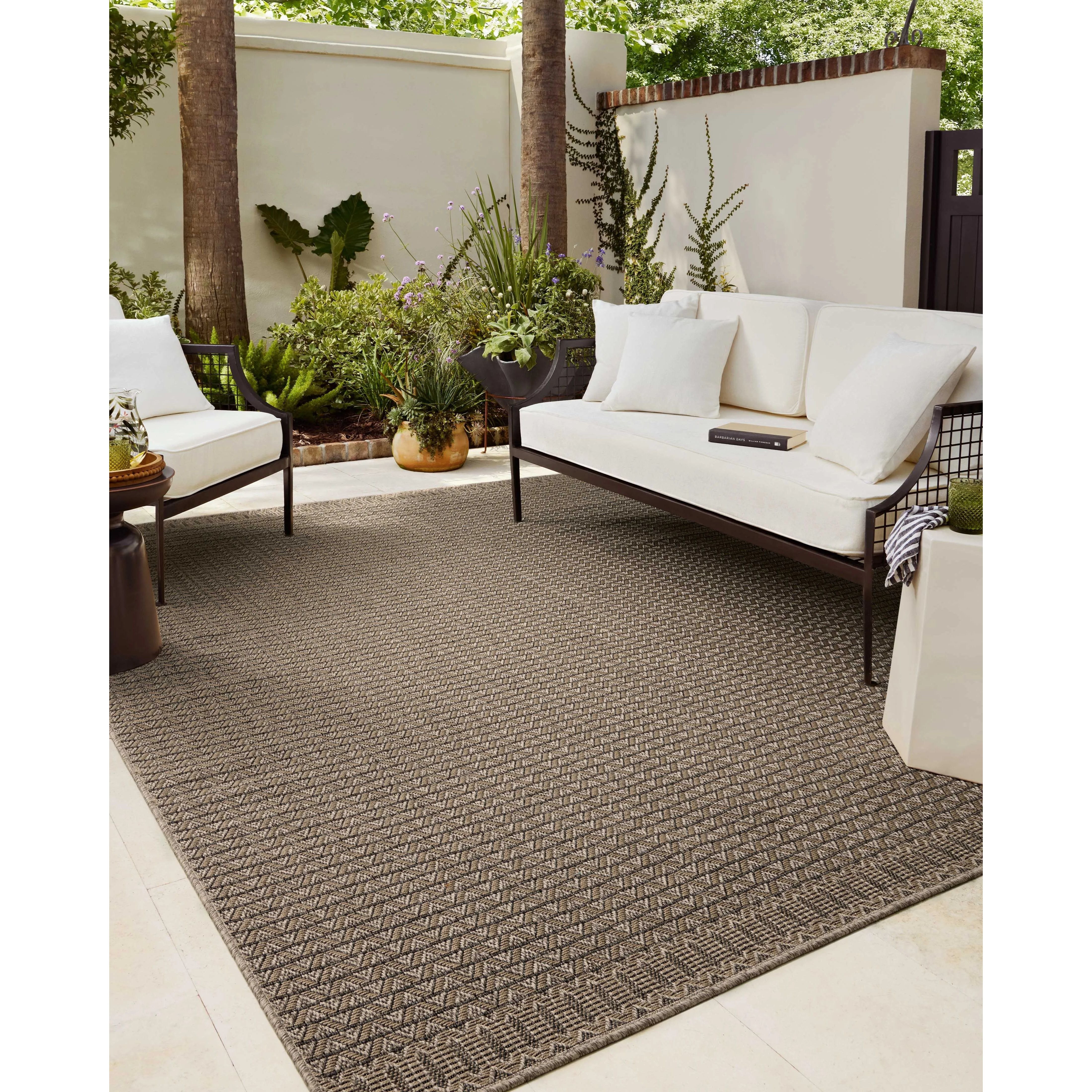 The Providence Collection is an indoor/outdoor rug with a woven-style design by Chris Loves Julia x Loloi. Providence is made of extra durable power-loomed polyester for versatile styling in patios, mudrooms, dining rooms, hallways, or more. Amethyst Home provides interior design, new home construction design consulting, vintage area rugs, and lighting in the Miami metro area.