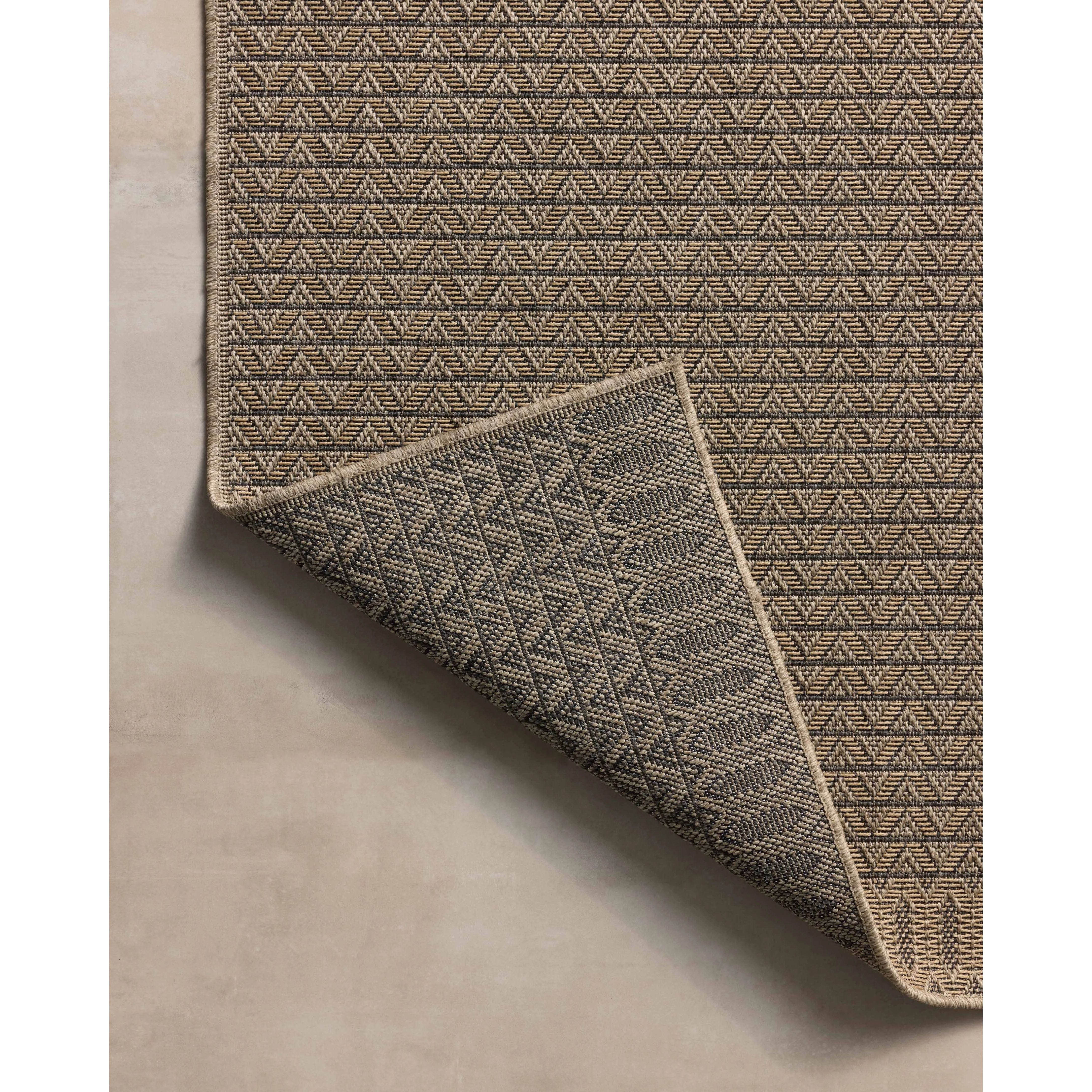 The Providence Collection is an indoor/outdoor rug with a woven-style design by Chris Loves Julia x Loloi. Providence is made of extra durable power-loomed polyester for versatile styling in patios, mudrooms, dining rooms, hallways, or more. Amethyst Home provides interior design, new home construction design consulting, vintage area rugs, and lighting in the Seattle metro area.