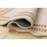 Featuring Chris Loves Julia × Loloi Scottie Ivory / Rust Rug by Loloi at Amethyst Home. The Scottie Collection from Chris Loves Julia x Loloi is a hand-tufted wool area rug with a playful scalloped edge and lower-pile, striped border for a touch of structure. The rugs overall pile is thick and plush, available in easygoing earth tones and neutral colorways. Th. Amethyst Home provides interior design, new home construction design consulting, vintage area rugs, and lighting in the Austin metro area.