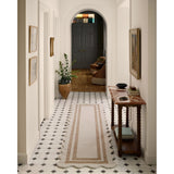 Featuring Chris Loves Julia × Loloi Scottie Ivory / Rust Rug by Loloi at Amethyst Home. The Scottie Collection from Chris Loves Julia x Loloi is a hand-tufted wool area rug with a playful scalloped edge and lower-pile, striped border for a touch of structure. The rugs overall pile is thick and plush, available in easygoing earth tones and neutral colorways.. Amethyst Home provides interior design, new home construction design consulting, vintage area rugs, and lighting in the Charlotte metro area.