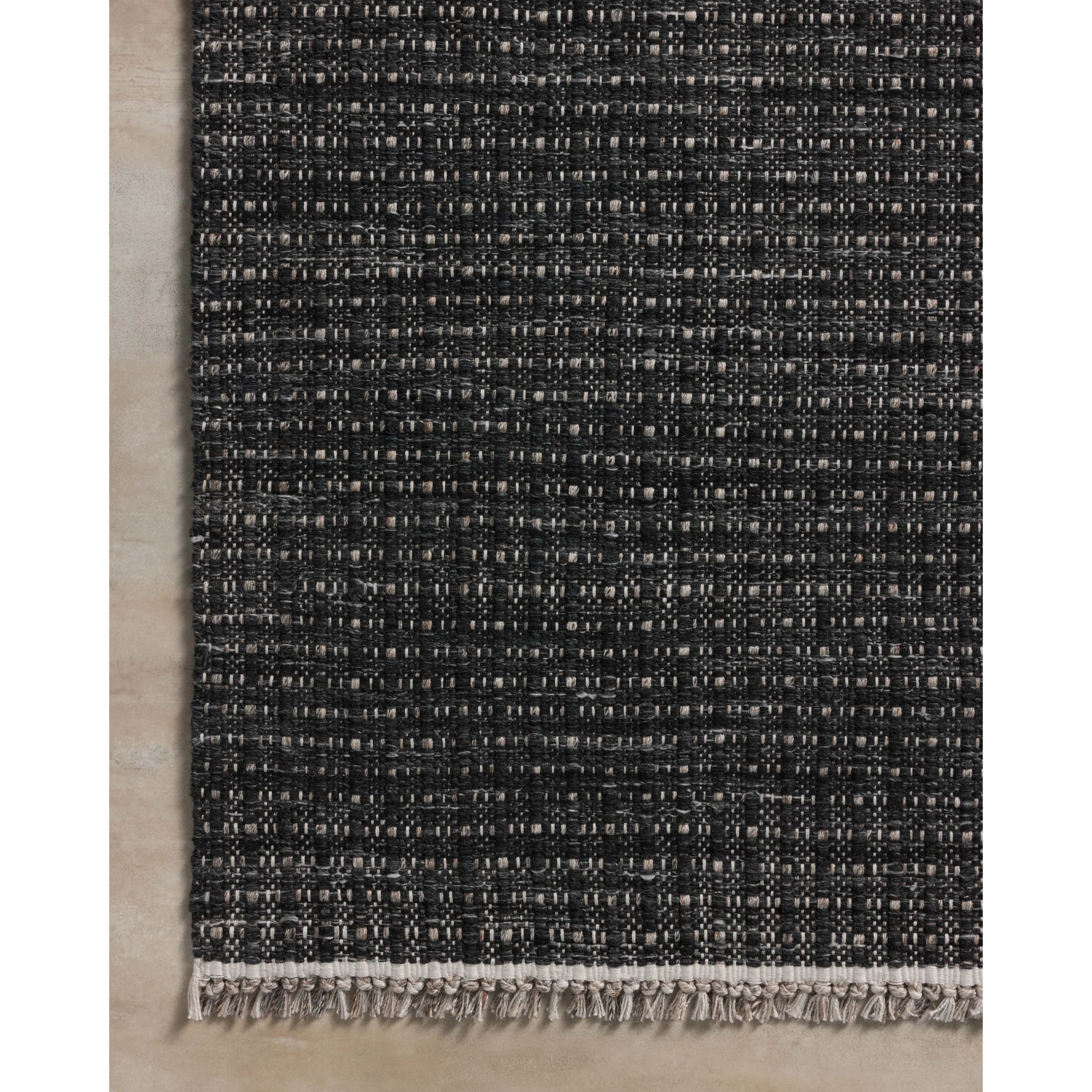 The Duncan Collection is a handmade area rug thats interwoven with white threads for subtle contrast and finished with fringed edges. This collection is soft yet exceptionally durable and easy to clean, making it right at home in busy living rooms, entryways, dining rooms, and outdoor patios. Amethyst Home provides interior design, new home construction design consulting, vintage area rugs, and lighting in the Laguna Beach metro area.
