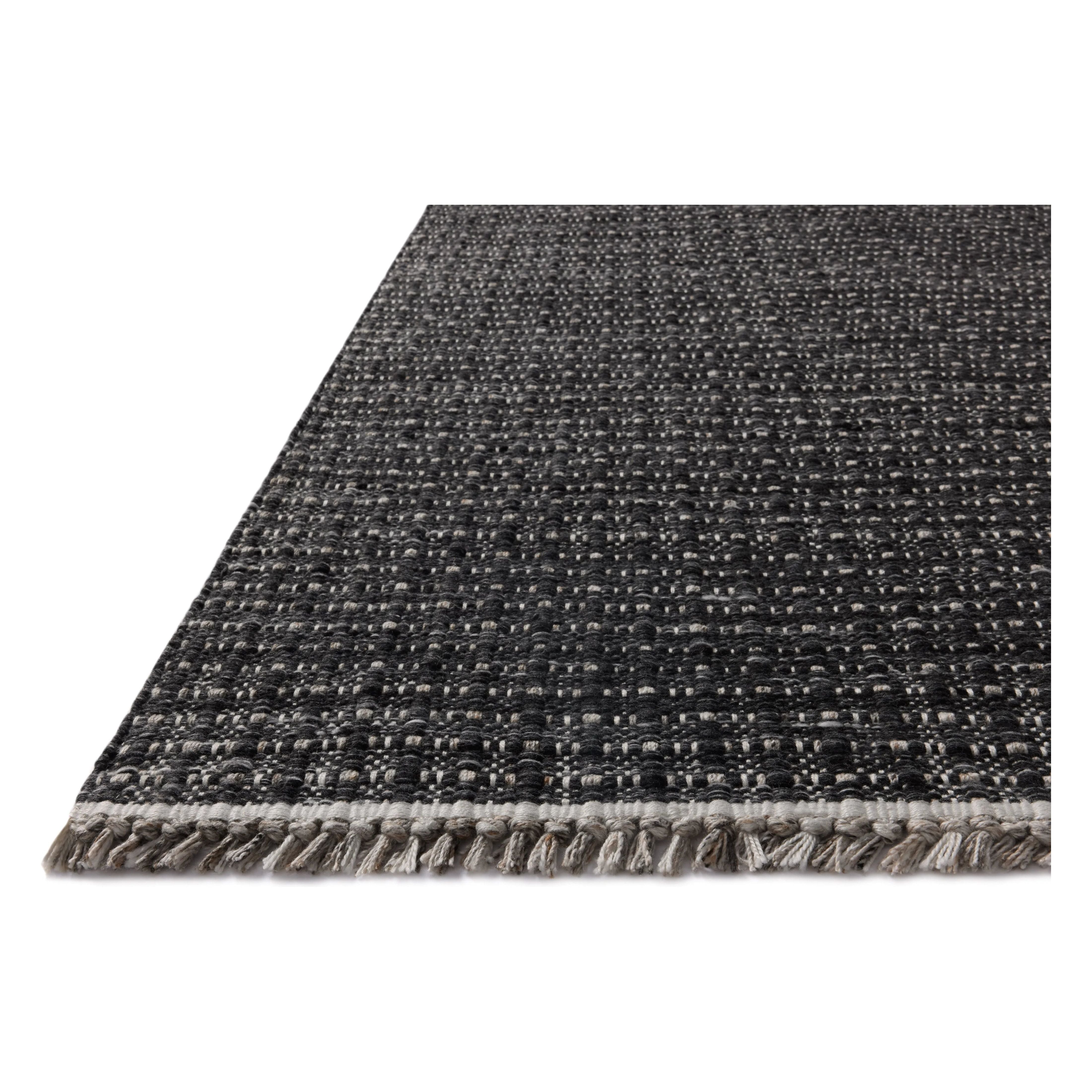 The Duncan Collection is a handmade area rug thats interwoven with white threads for subtle contrast and finished with fringed edges. This collection is soft yet exceptionally durable and easy to clean, making it right at home in busy living rooms, entryways, dining rooms, and outdoor patios. Amethyst Home provides interior design, new home construction design consulting, vintage area rugs, and lighting in the Portland metro area.