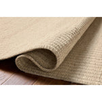 The Elma Collection is a vertically striped area rug framed with whip-stitched edges to help ground your space. This timeless, neutral rug is great for high-traffic living rooms, bedrooms, and dining rooms of many home decor styles. Amethyst Home provides interior design, new home construction design consulting, vintage area rugs, and lighting in the Nashville metro area.