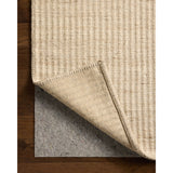 The Elma Collection is a vertically striped area rug framed with whip-stitched edges to help ground your space. This timeless, neutral rug is great for high-traffic living rooms, bedrooms, and dining rooms of many home decor styles. Amethyst Home provides interior design, new home construction design consulting, vintage area rugs, and lighting in the Tampa metro area.