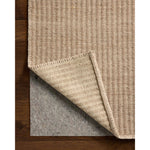 The Elma Collection is a vertically striped area rug framed with whip-stitched edges to help ground your space. This timeless, neutral rug is great for high-traffic living rooms, bedrooms, and dining rooms of many home decor styles. Amethyst Home provides interior design, new home construction design consulting, vintage area rugs, and lighting in the Des Moines metro area.