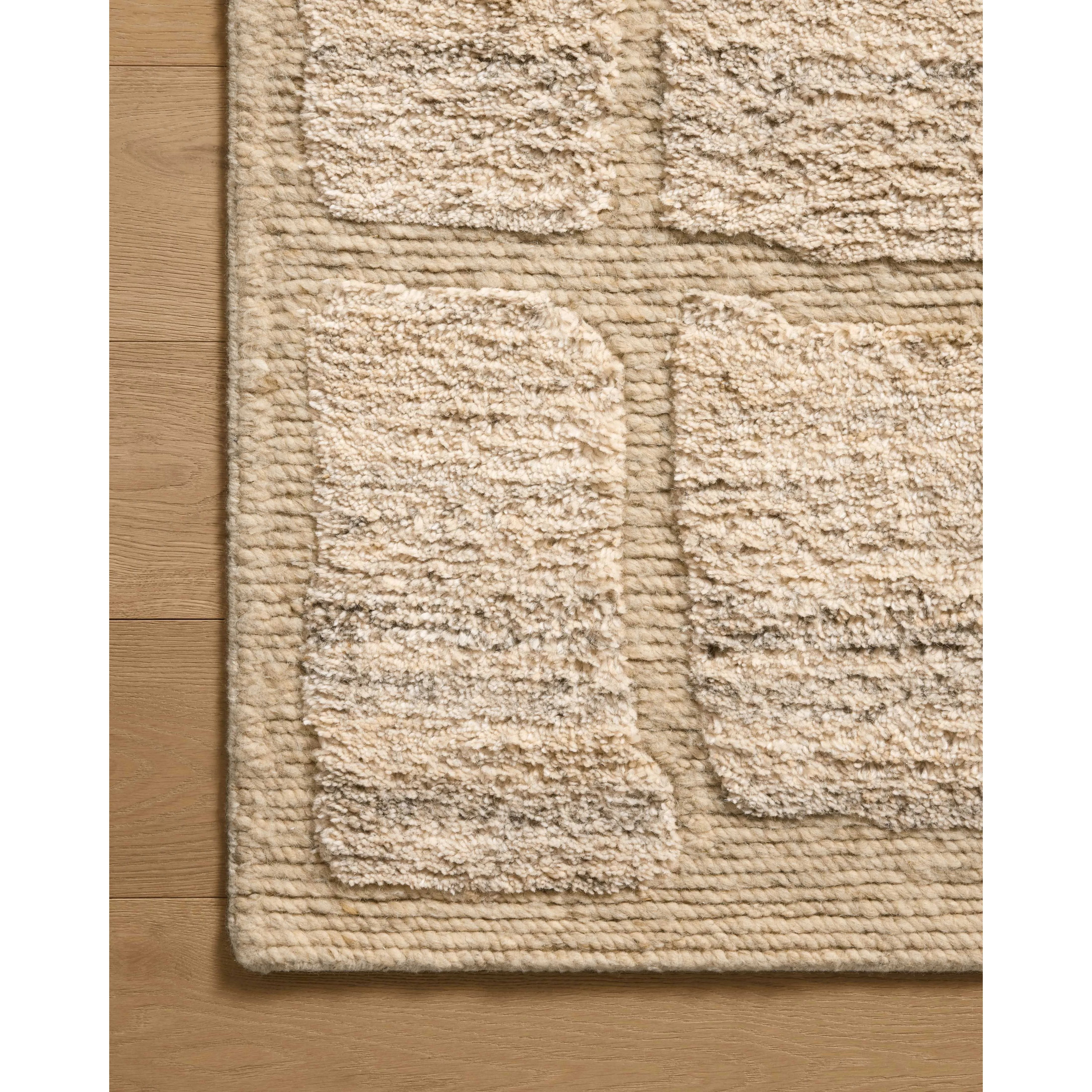 The Hughes Collection is a chunky and soft hand-knotted area rug with a graphic pattern for elevated home decor. The design comes to life with a space-dyed pile that reveals a multitude of beautiful tones, perfect for living rooms, bedrooms, and more high-traffic areas. Amethyst Home provides interior design, new home construction design consulting, vintage area rugs, and lighting in the Monterey metro area.