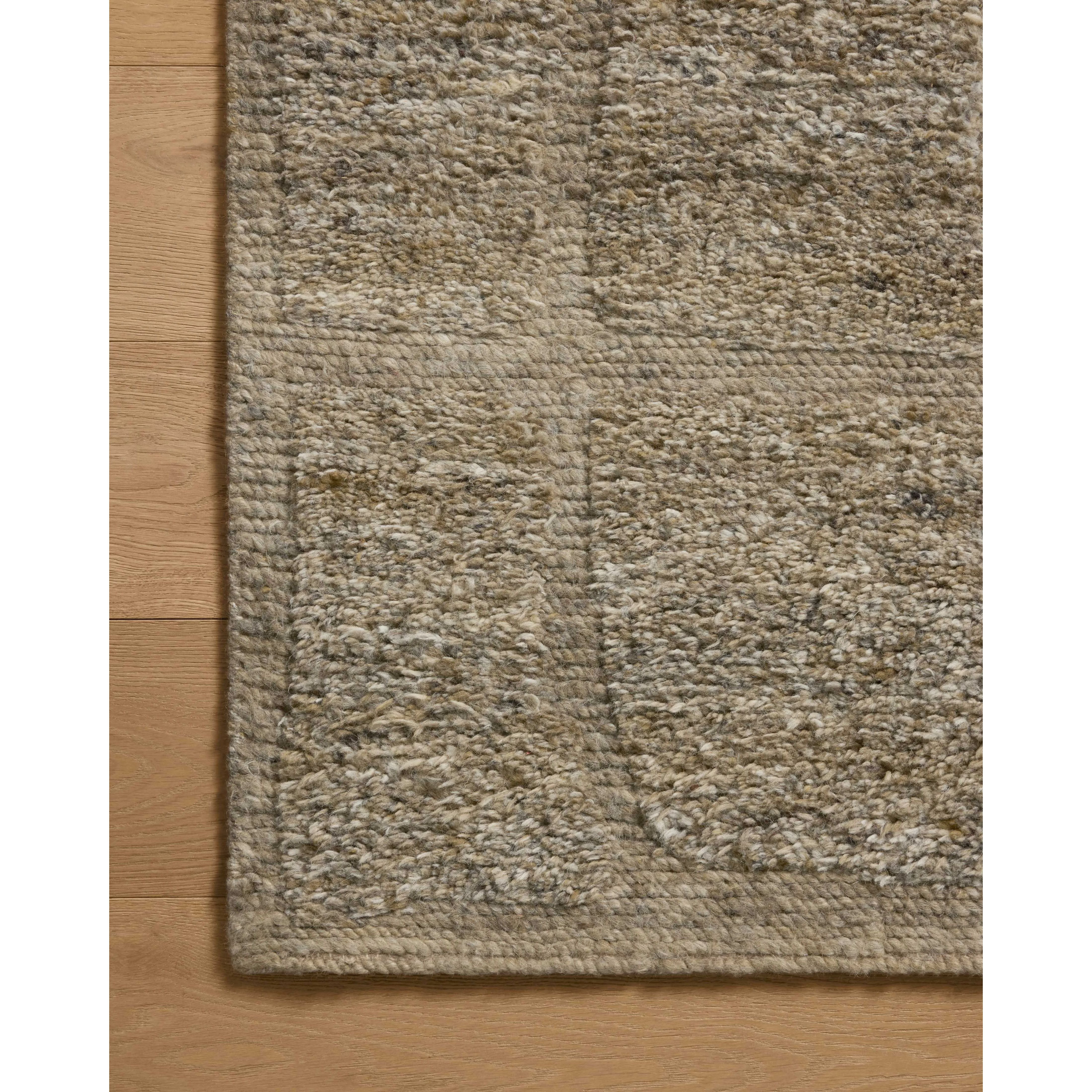 The Hughes Collection is a chunky and soft hand-knotted area rug with a graphic pattern for elevated home decor. The design comes to life with a space-dyed pile that reveals a multitude of beautiful tones, perfect for living rooms, bedrooms, and more high-traffic areas. Amethyst Home provides interior design, new home construction design consulting, vintage area rugs, and lighting in the Scottsdale metro area.