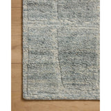 The Hughes Collection is a chunky and soft hand-knotted area rug with a graphic pattern for elevated home decor. The design comes to life with a space-dyed pile that reveals a multitude of beautiful tones, perfect for living rooms, bedrooms, and more high-traffic areas. Amethyst Home provides interior design, new home construction design consulting, vintage area rugs, and lighting in the Charlotte metro area.