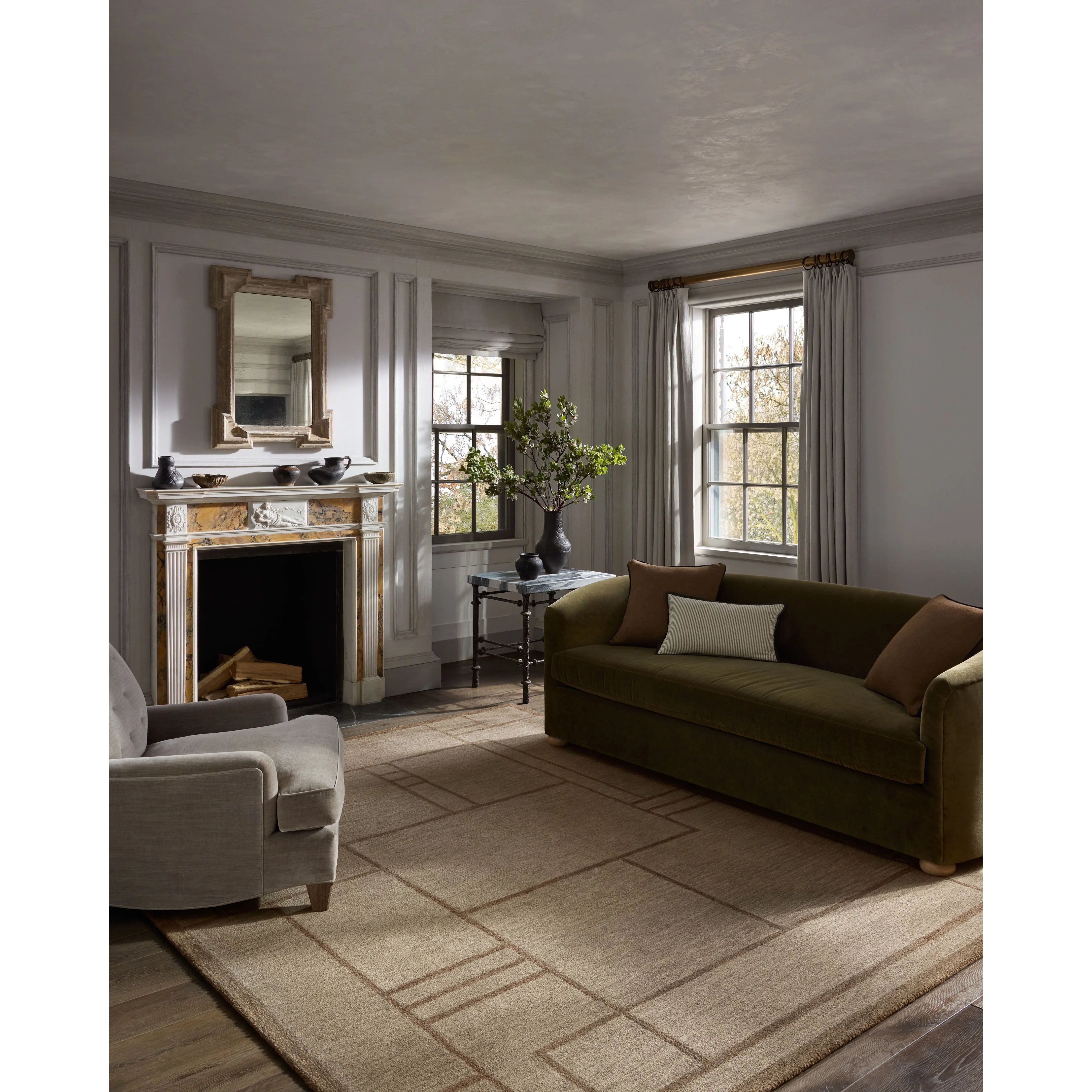 The Barrow Collection by Jeremiah Brent x Loloi is a hand-tufted area rug with a bold linear design inspired by modern art and classical architecture. The rugs pile is a blend of wool and jute for a stable, substantial feel that can ground living rooms, dining rooms, bedrooms, and more. Amethyst Home provides interior design, new home construction design consulting, vintage area rugs, and lighting in the Kansas City metro area.