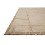 The Barrow Collection by Jeremiah Brent x Loloi is a hand-tufted area rug with a bold linear design inspired by modern art and classical architecture. The rug’s pile is a blend of wool and jute for a stable, substantial feel that can ground living rooms, dining rooms, bedrooms, and more. Amethyst Home provides interior design, new home construction design consulting, vintage area rugs, and lighting in the Washington metro area.