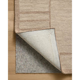 The Barrow Collection by Jeremiah Brent x Loloi is a hand-tufted area rug with a bold linear design inspired by modern art and classical architecture. The rug’s pile is a blend of wool and jute for a stable, substantial feel that can ground living rooms, dining rooms, bedrooms, and more. Amethyst Home provides interior design, new home construction design consulting, vintage area rugs, and lighting in the Winter Garden metro area.