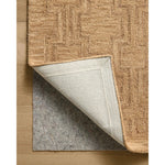 The Barrow Collection by Jeremiah Brent x Loloi is a hand-tufted area rug with a bold linear design inspired by modern art and classical architecture. The rugs pile is a blend of wool and jute for a stable, substantial feel that can ground living rooms, dining rooms, bedrooms, and more. Amethyst Home provides interior design, new home construction design consulting, vintage area rugs, and lighting in the Omaha metro area.