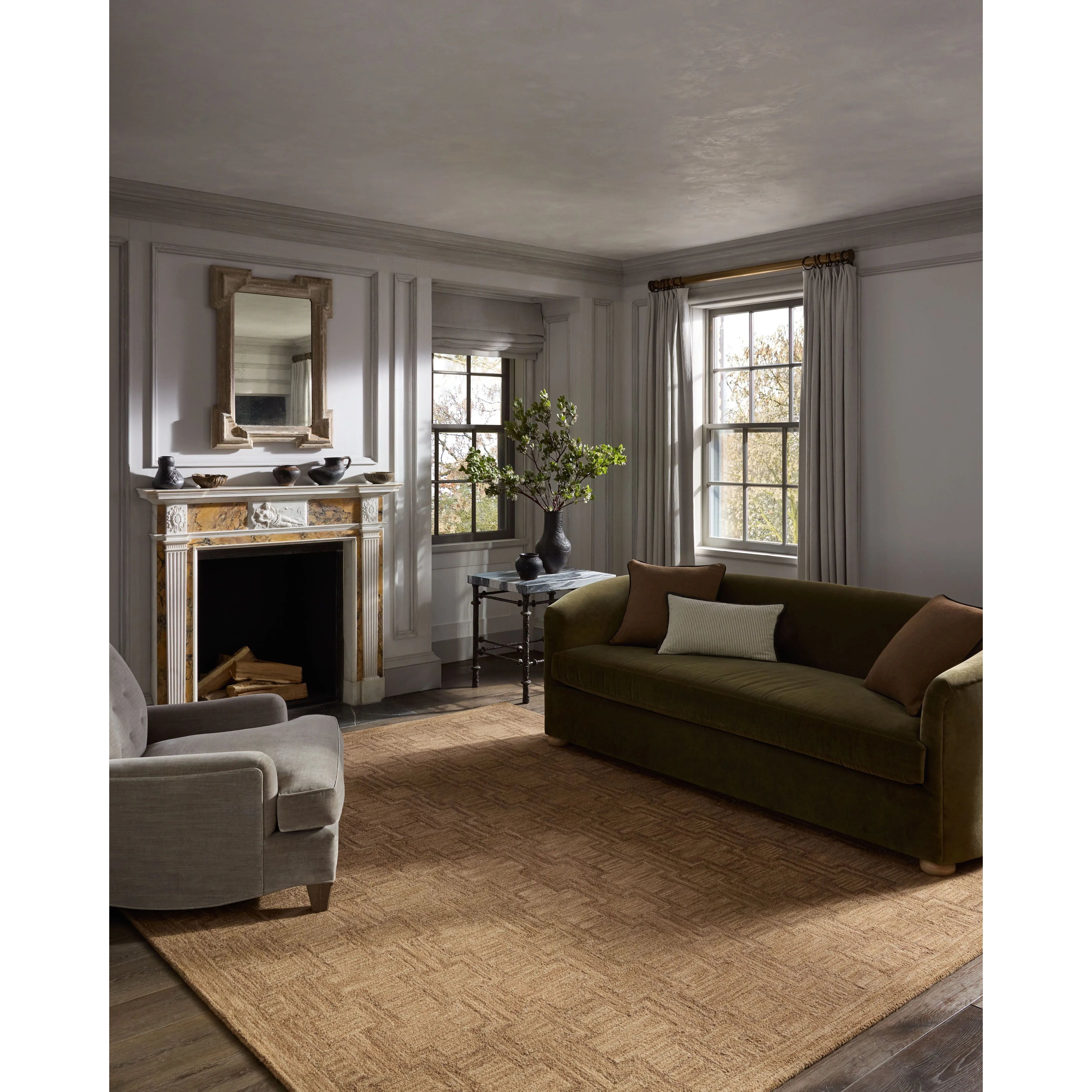 The Barrow Collection by Jeremiah Brent x Loloi is a hand-tufted area rug with a bold linear design inspired by modern art and classical architecture. The rugs pile is a blend of wool and jute for a stable, substantial feel that can ground living rooms, dining rooms, bedrooms, and more. Amethyst Home provides interior design, new home construction design consulting, vintage area rugs, and lighting in the Scottsdale metro area.
