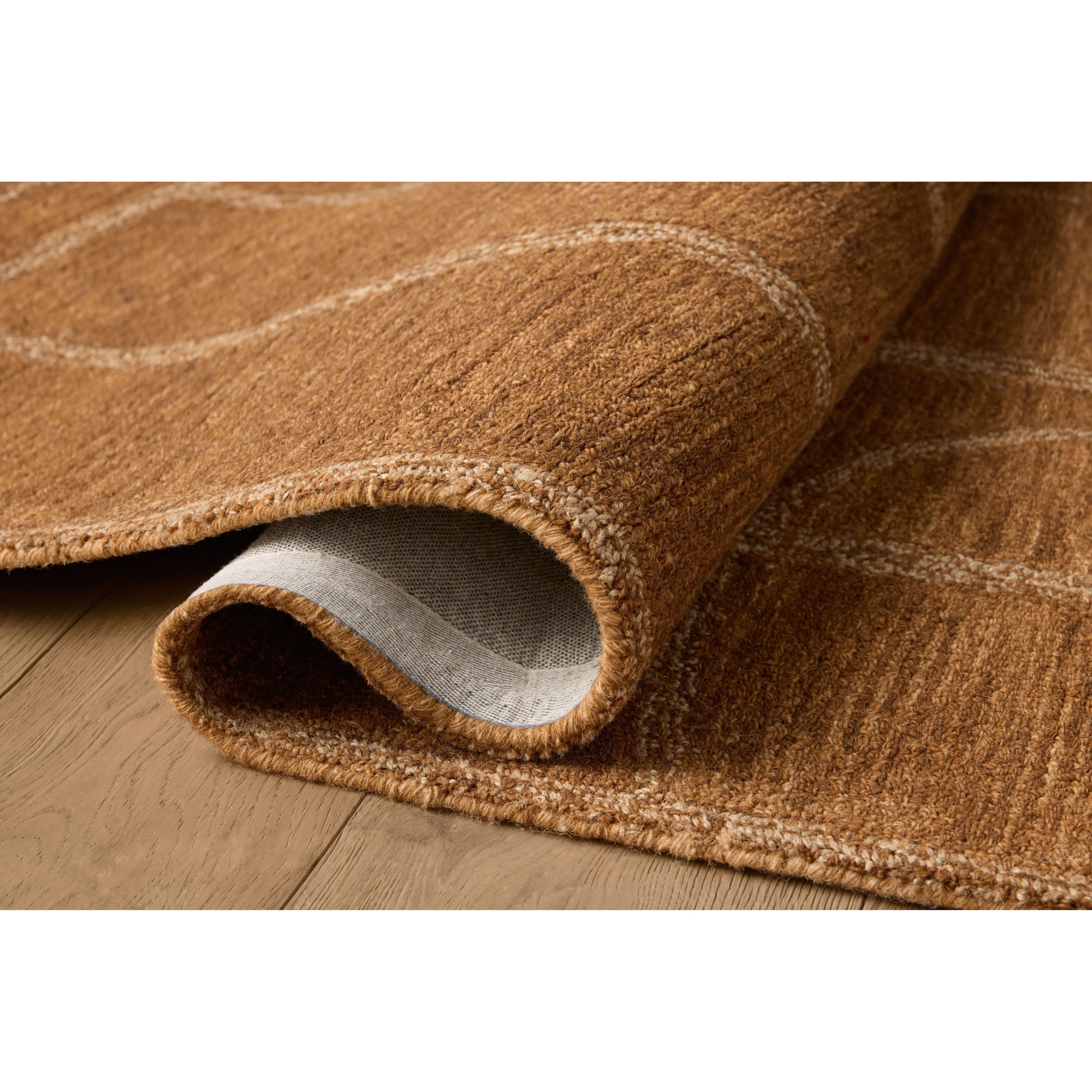 The Barrow Collection by Jeremiah Brent x Loloi is a hand-tufted area rug with a bold linear design inspired by modern art and classical architecture. The rug’s pile is a blend of wool and jute for a stable, substantial feel that can ground living rooms, dining rooms, bedrooms, and more. Amethyst Home provides interior design, new home construction design consulting, vintage area rugs, and lighting in the Omaha metro area.