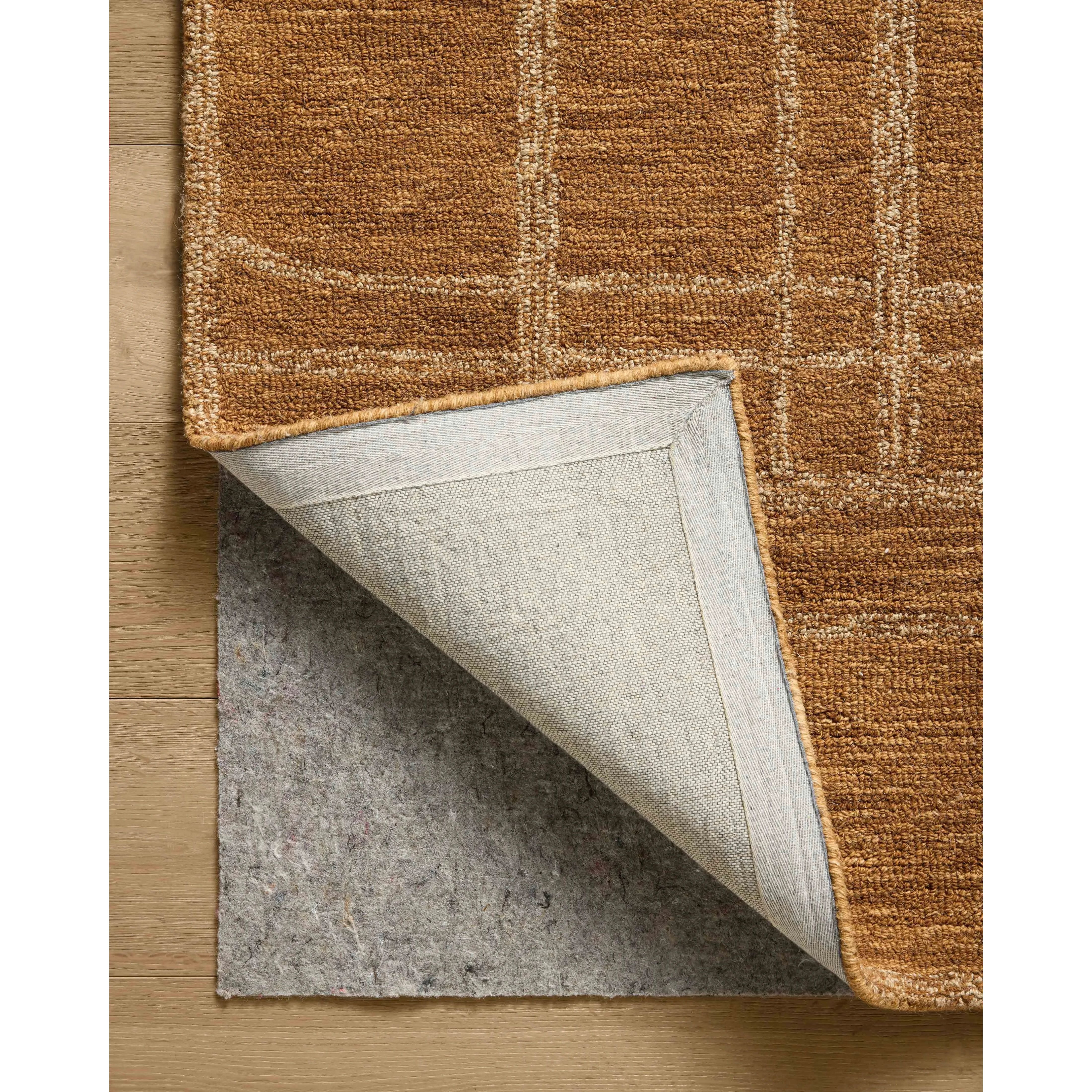 The Barrow Collection by Jeremiah Brent x Loloi is a hand-tufted area rug with a bold linear design inspired by modern art and classical architecture. The rugs pile is a blend of wool and jute for a stable, substantial feel that can ground living rooms, dining rooms, bedrooms, and more. Amethyst Home provides interior design, new home construction design consulting, vintage area rugs, and lighting in the Tampa metro area.