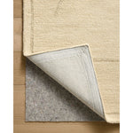 The Barrow Collection by Jeremiah Brent x Loloi is a hand-tufted area rug with a bold linear design inspired by modern art and classical architecture. The rugs pile is a blend of wool and jute for a stable, substantial feel that can ground living rooms, dining rooms, bedrooms, and more. Amethyst Home provides interior design, new home construction design consulting, vintage area rugs, and lighting in the Austin metro area.