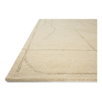 The Barrow Collection by Jeremiah Brent x Loloi is a hand-tufted area rug with a bold linear design inspired by modern art and classical architecture. The rugs pile is a blend of wool and jute for a stable, substantial feel that can ground living rooms, dining rooms, bedrooms, and more. Amethyst Home provides interior design, new home construction design consulting, vintage area rugs, and lighting in the Kansas City metro area.