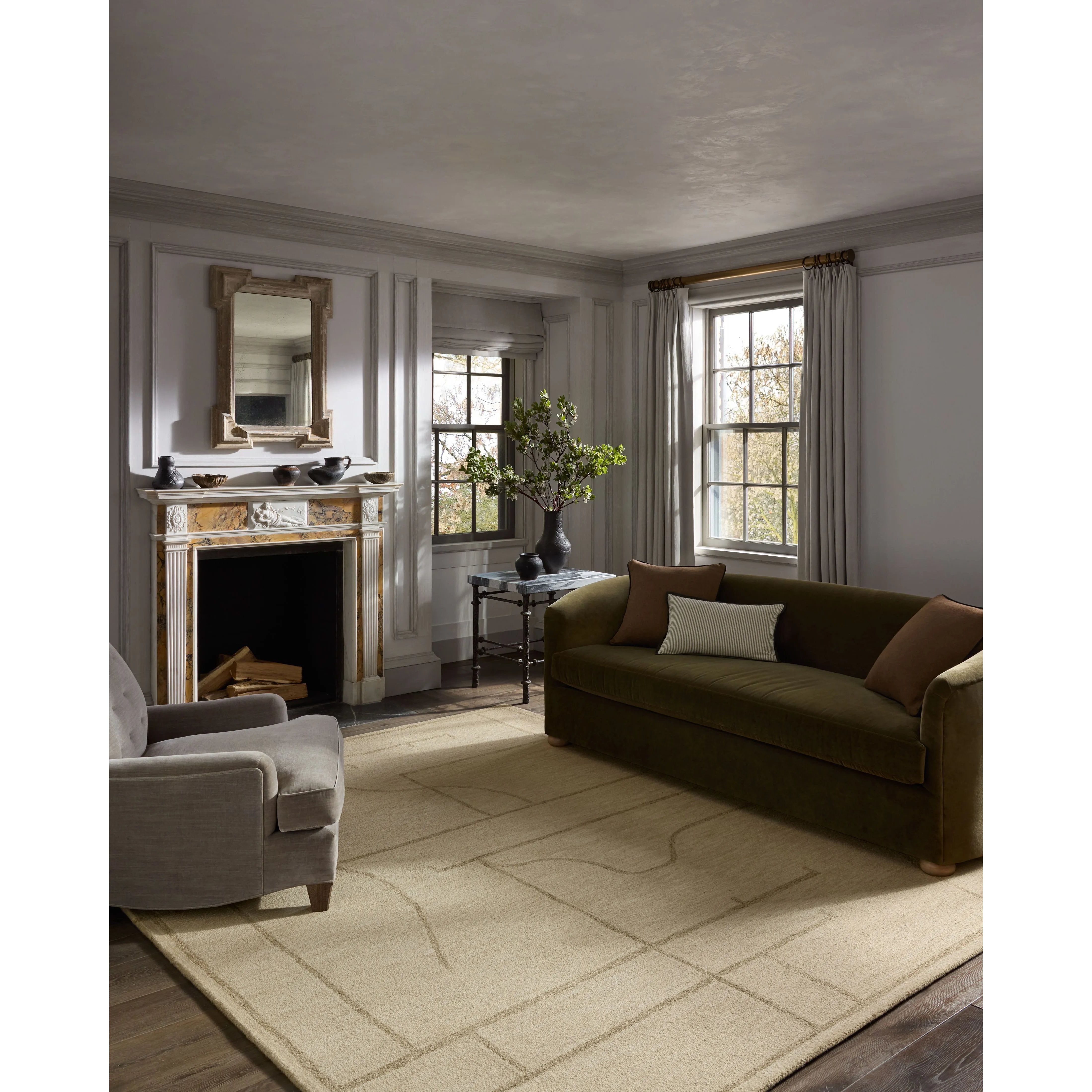 The Barrow Collection by Jeremiah Brent x Loloi is a hand-tufted area rug with a bold linear design inspired by modern art and classical architecture. The rugs pile is a blend of wool and jute for a stable, substantial feel that can ground living rooms, dining rooms, bedrooms, and more. Amethyst Home provides interior design, new home construction design consulting, vintage area rugs, and lighting in the Laguna Beach metro area.