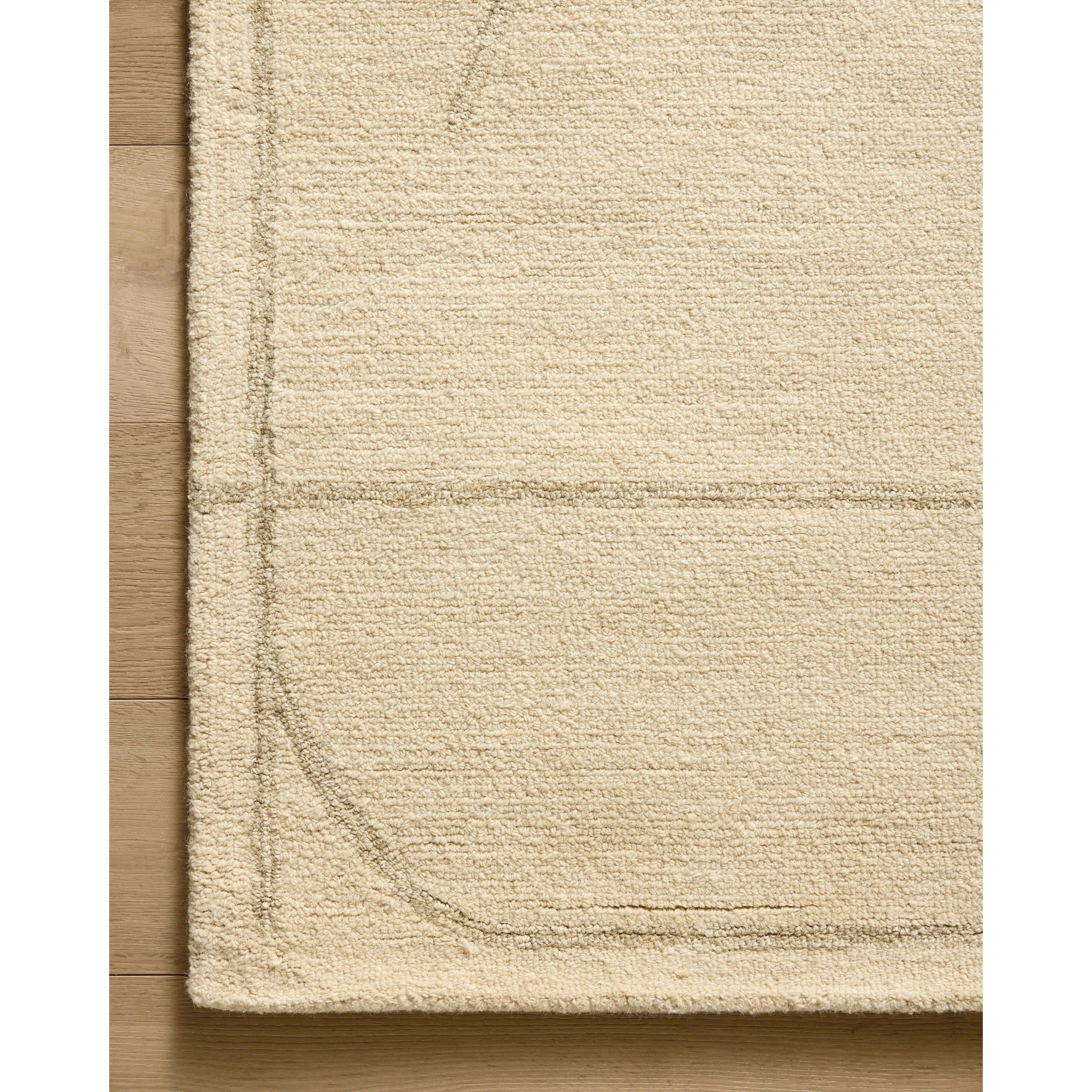 The Barrow Collection by Jeremiah Brent x Loloi is a hand-tufted area rug with a bold linear design inspired by modern art and classical architecture. The rugs pile is a blend of wool and jute for a stable, substantial feel that can ground living rooms, dining rooms, bedrooms, and more. Amethyst Home provides interior design, new home construction design consulting, vintage area rugs, and lighting in the Los Angeles metro area.