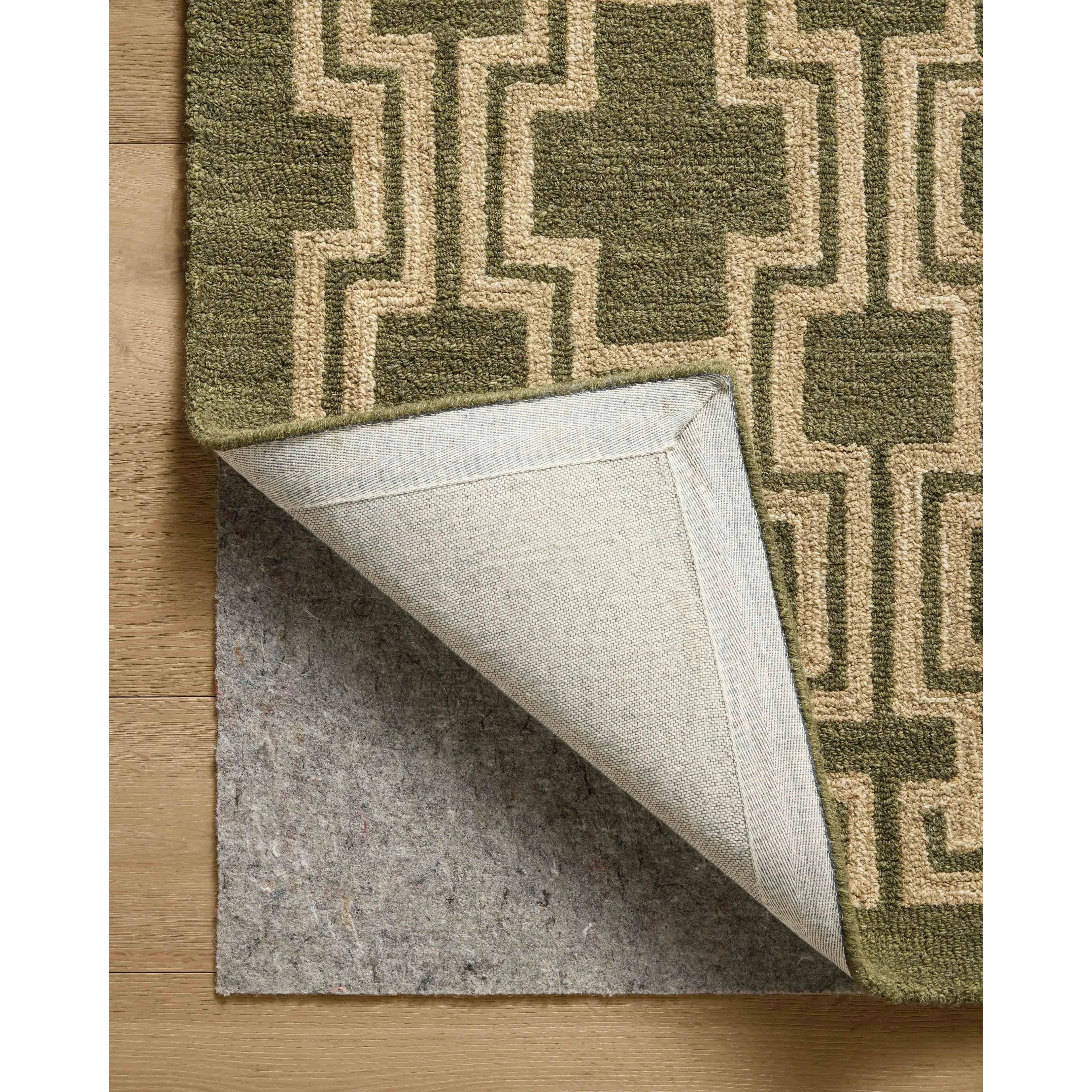 The Barrow Collection by Jeremiah Brent x Loloi is a hand-tufted area rug with a bold linear design inspired by modern art and classical architecture. The rugs pile is a blend of wool and jute for a stable, substantial feel that can ground living rooms, dining rooms, bedrooms, and more. Amethyst Home provides interior design, new home construction design consulting, vintage area rugs, and lighting in the Boston metro area.