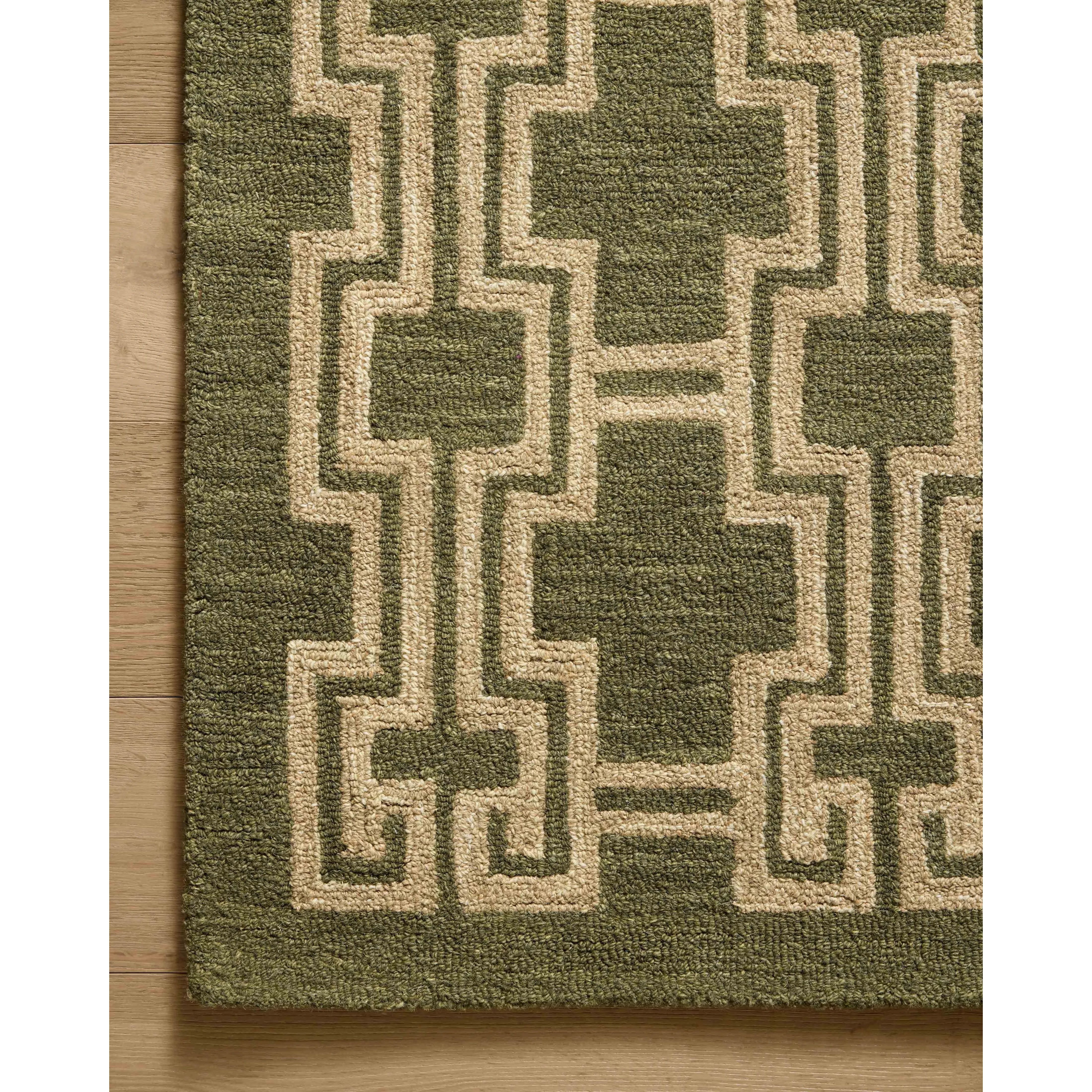 The Barrow Collection by Jeremiah Brent x Loloi is a hand-tufted area rug with a bold linear design inspired by modern art and classical architecture. The rugs pile is a blend of wool and jute for a stable, substantial feel that can ground living rooms, dining rooms, bedrooms, and more. Amethyst Home provides interior design, new home construction design consulting, vintage area rugs, and lighting in the Charlotte metro area.