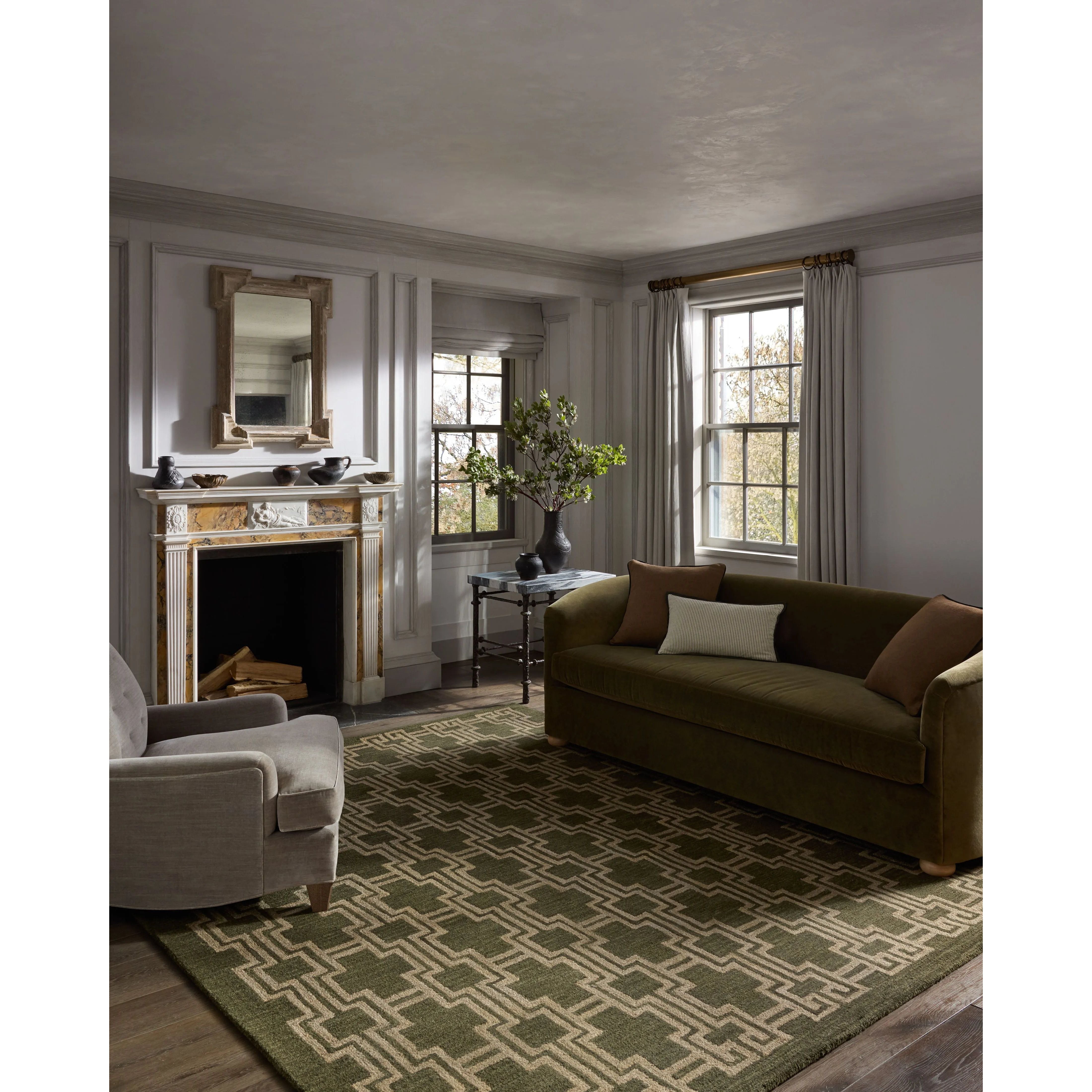 The Barrow Collection by Jeremiah Brent x Loloi is a hand-tufted area rug with a bold linear design inspired by modern art and classical architecture. The rugs pile is a blend of wool and jute for a stable, substantial feel that can ground living rooms, dining rooms, bedrooms, and more. Amethyst Home provides interior design, new home construction design consulting, vintage area rugs, and lighting in the Houston metro area.