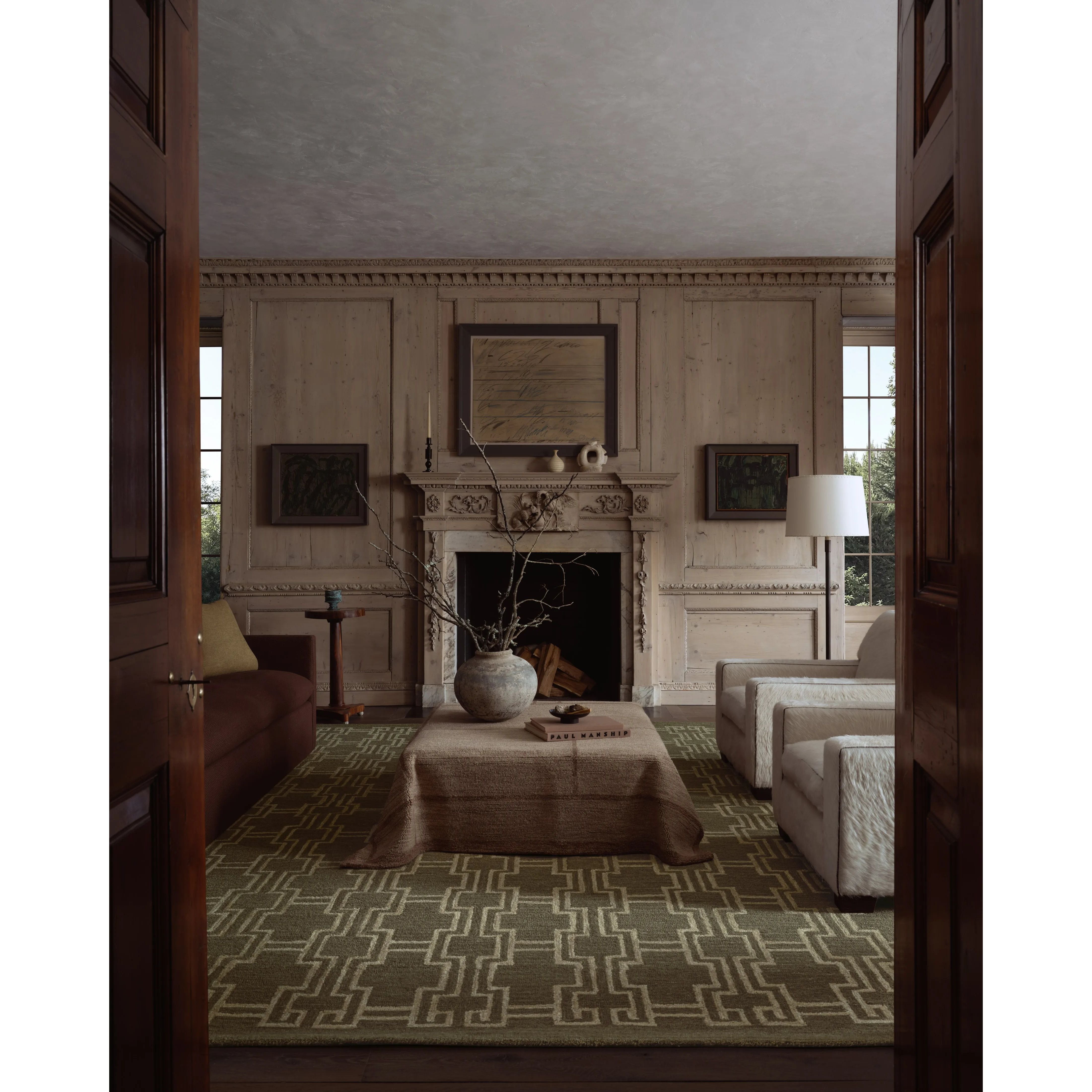 The Barrow Collection by Jeremiah Brent x Loloi is a hand-tufted area rug with a bold linear design inspired by modern art and classical architecture. The rugs pile is a blend of wool and jute for a stable, substantial feel that can ground living rooms, dining rooms, bedrooms, and more. Amethyst Home provides interior design, new home construction design consulting, vintage area rugs, and lighting in the Laguna Beach metro area.