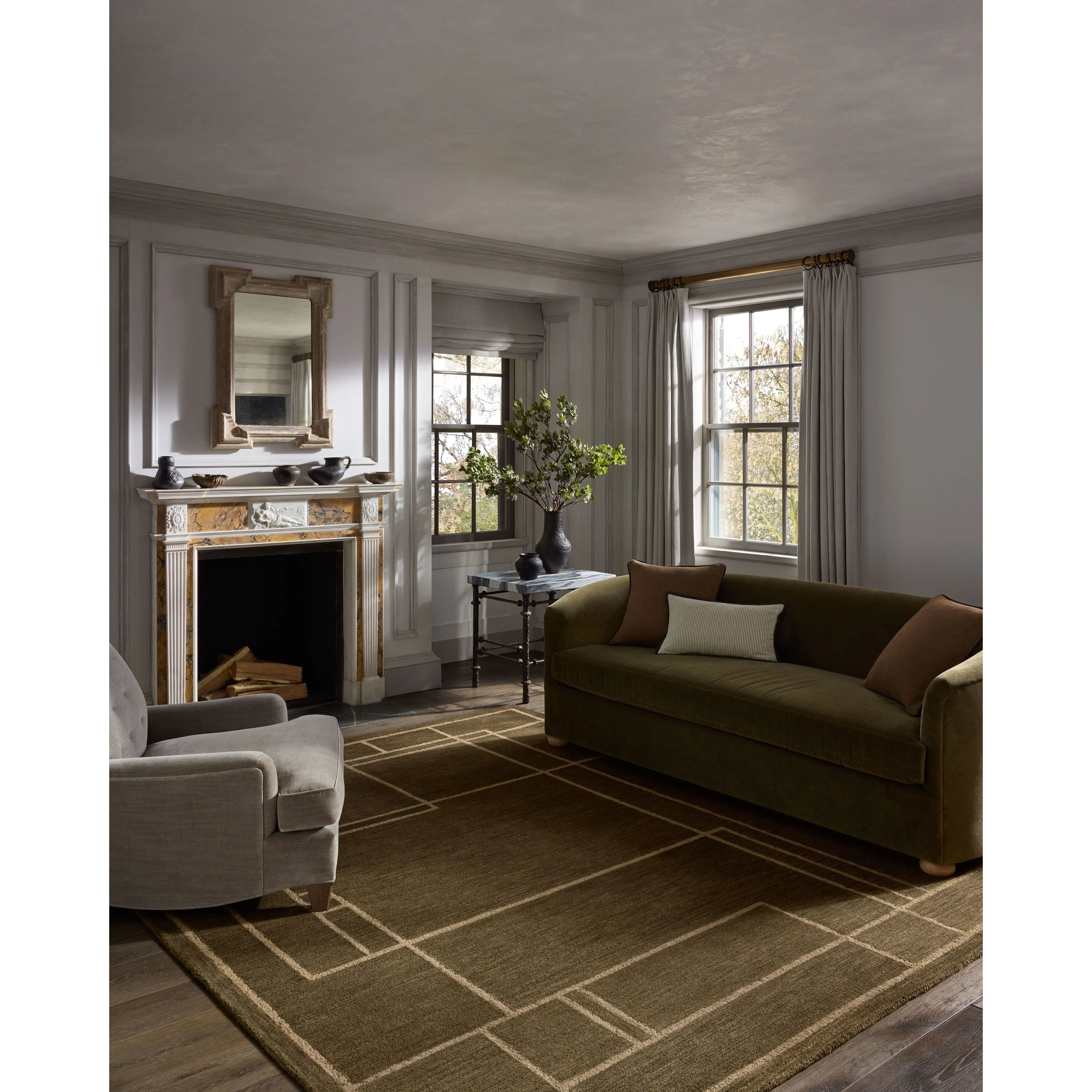 The Barrow Collection by Jeremiah Brent x Loloi is a hand-tufted area rug with a bold linear design inspired by modern art and classical architecture. The rugs pile is a blend of wool and jute for a stable, substantial feel that can ground living rooms, dining rooms, bedrooms, and more. Amethyst Home provides interior design, new home construction design consulting, vintage area rugs, and lighting in the Portland metro area.