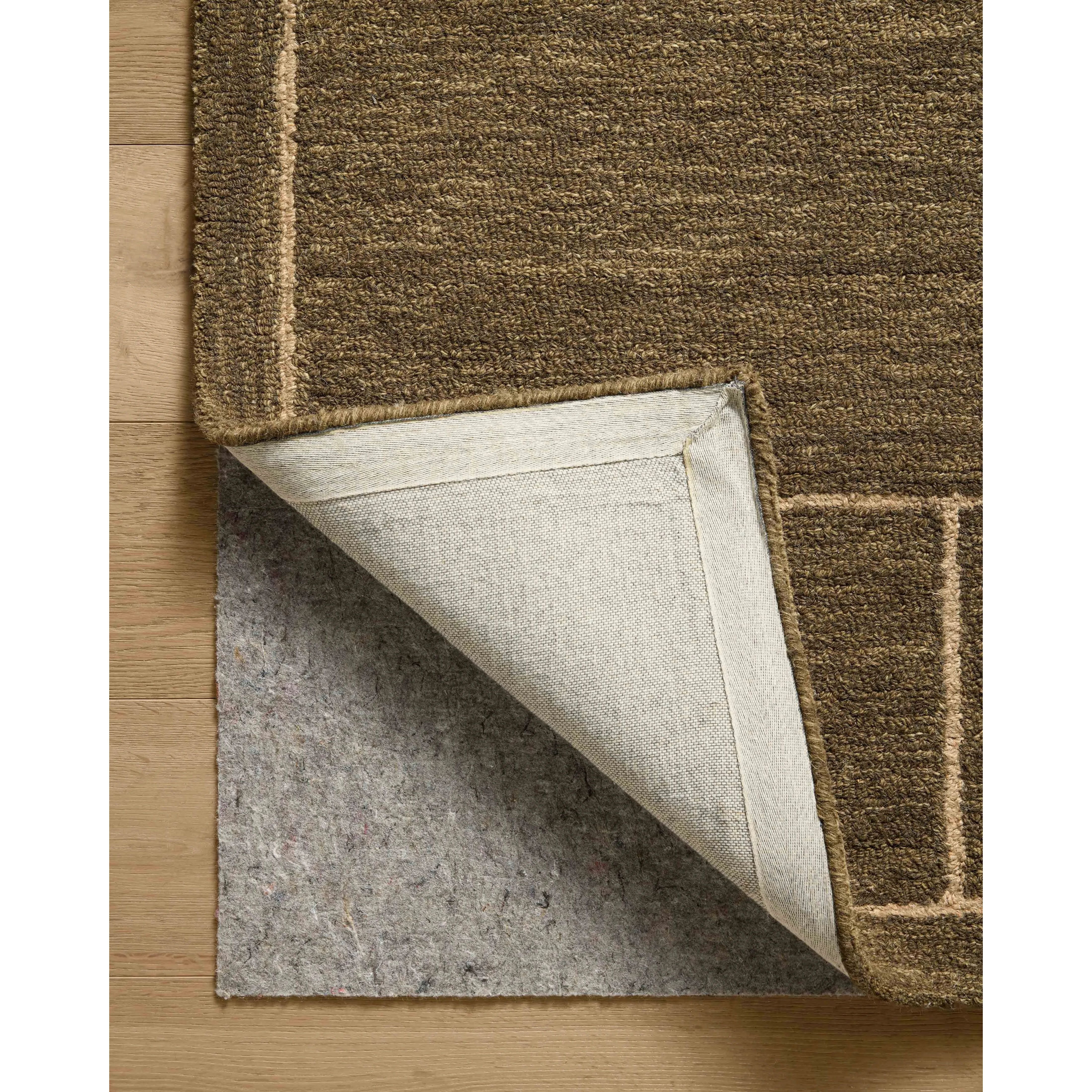 The Barrow Collection by Jeremiah Brent x Loloi is a hand-tufted area rug with a bold linear design inspired by modern art and classical architecture. The rugs pile is a blend of wool and jute for a stable, substantial feel that can ground living rooms, dining rooms, bedrooms, and more. Amethyst Home provides interior design, new home construction design consulting, vintage area rugs, and lighting in the Salt Lake City metro area.