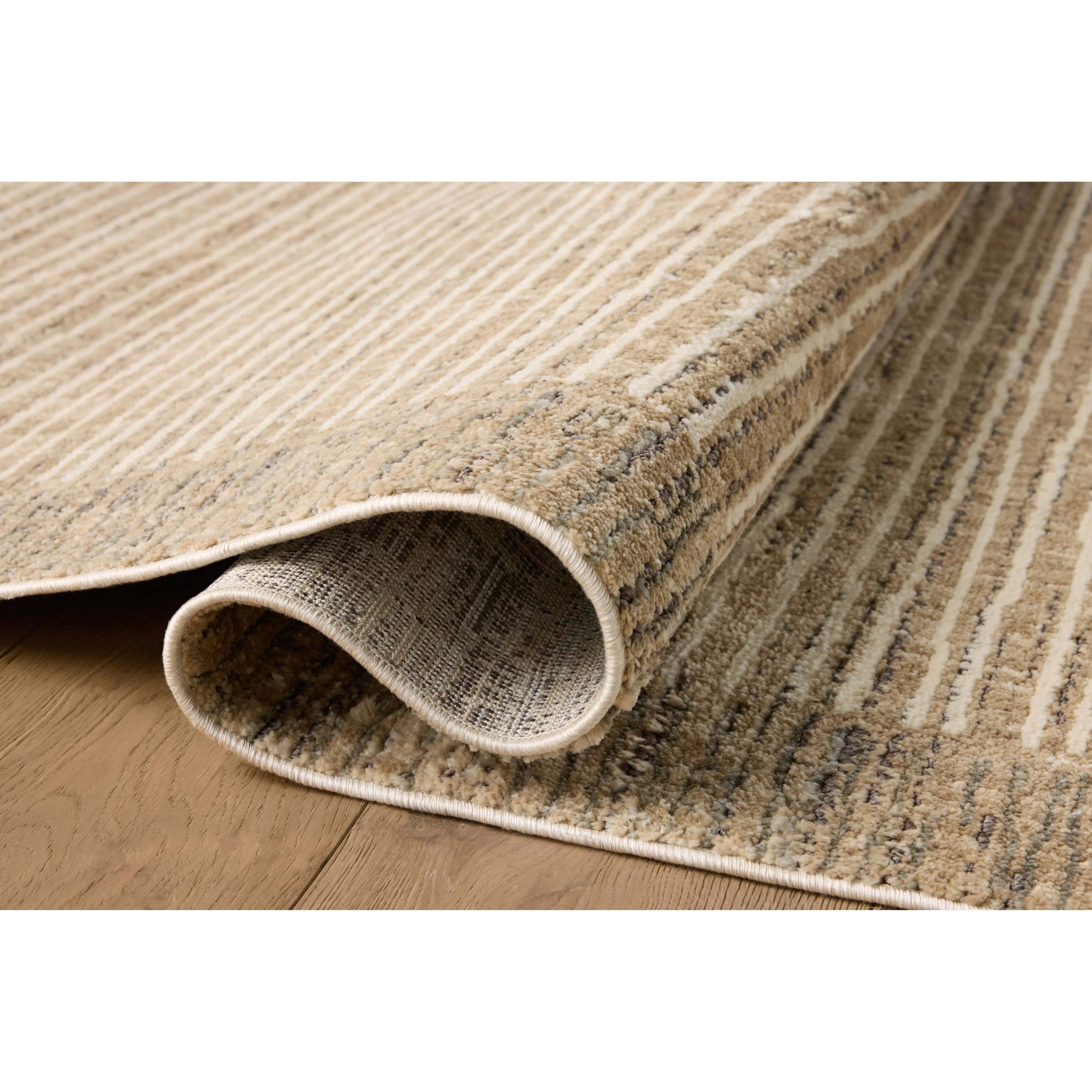The Bleecker Collection by Jeremiah Brent x Loloi is a soft, power-loomed rug in warm colorways that change in different lighting. With high-contrast linear patterns and careful distressing, Bleecker represents Jeremiah love of modern design. Amethyst Home provides interior design, new home construction design consulting, vintage area rugs, and lighting in the Dallas metro area.