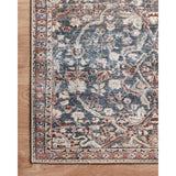 Durable, low pile, and soft underfoot, this rug is inspired by classic vintage and antique rugs. The Jules Chris Loves Julia Denim / Spice rug from Loloi features a beautiful vintage pattern and patina. The rug is easy to clean and maintain and perfect for living rooms, dining rooms, hallways, and kitchens!