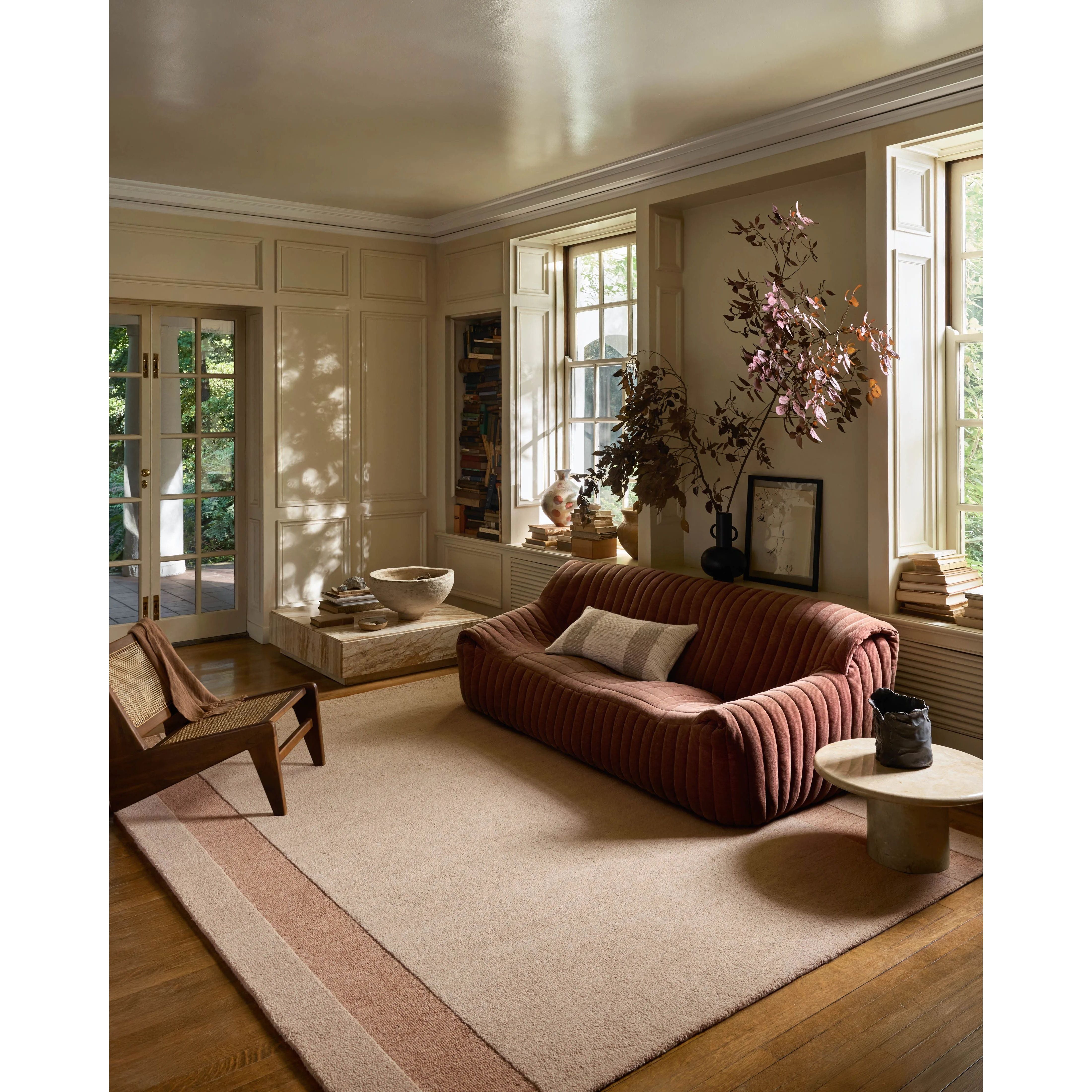 The Craven Collection is a hand-tufted area rug based on designs by Leanne Ford and made in collaboration with Loloi. Ford sketched classic stripes and checkerboards with an organic, free-flowing hand. The design comes to life with subtle space-dyed wool in creamy neutrals and rich, earthy tones. Amethyst Home provides interior design, new home construction design consulting, vintage area rugs, and lighting in the Los Angeles metro area.